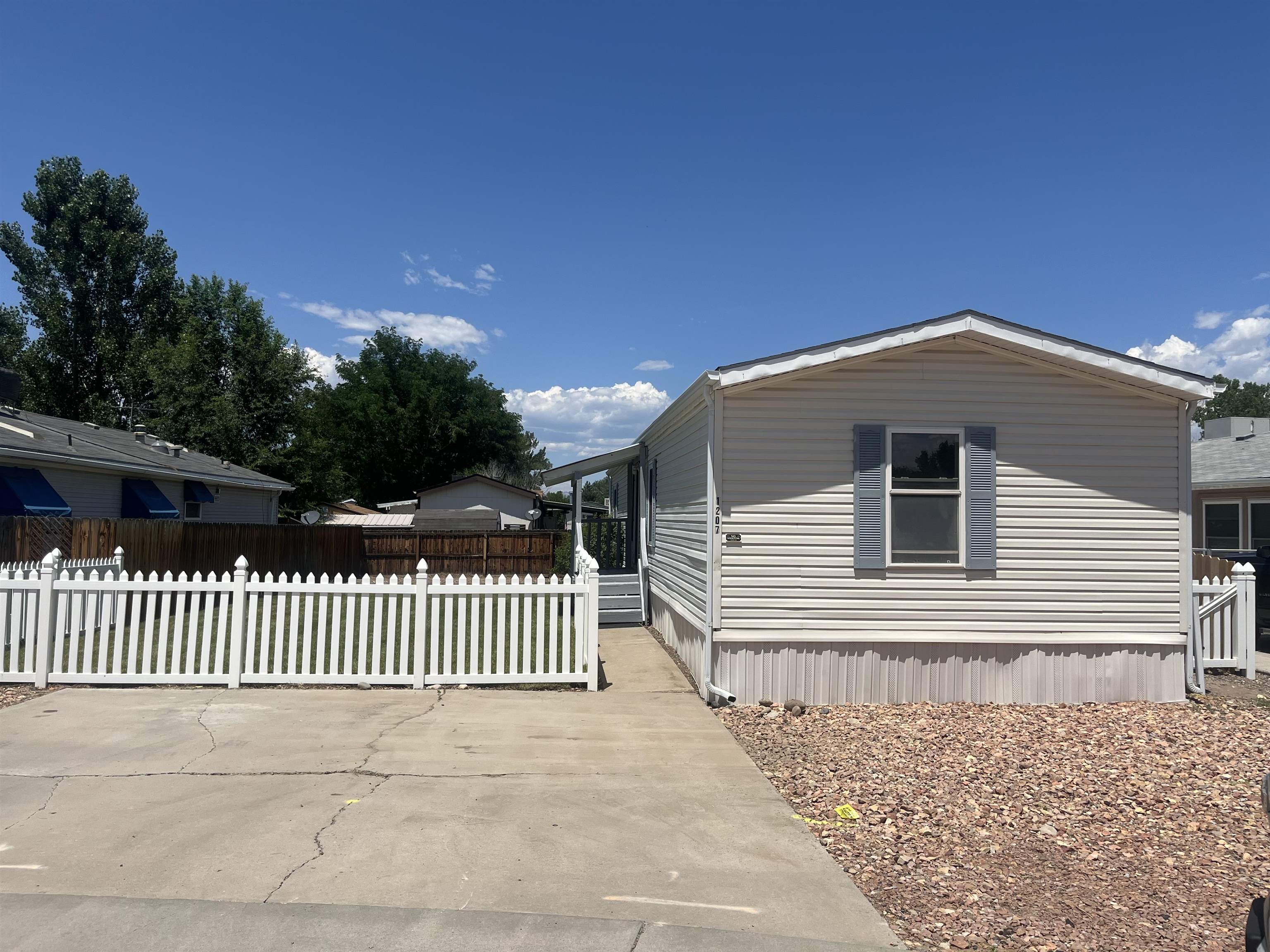 Charming Fruita home with the white picket fence is ready for you to move on in. This two bedroom two bath home has just  received a TON of beautiful updates inside and out. New sod in the  fenced in yard, new privacy fence, is all ready for your furry friends. There is an open area in the back of the yard for a patio, pool, garden, anything you want it to be, as well as a shed for additional storage. Watering is easy with the Automated sprinkler system. Inside you will find an all new stainless steal appliance suite, new counter tops and beautifully painted cabinets. Upgraded windows, and vaulted ceilings run throughout the home. Primary bathroom updates. So many things have been tastefully done you must come see for yourself. Home has been gone through top to bottom and repairs made based off of inspection report.