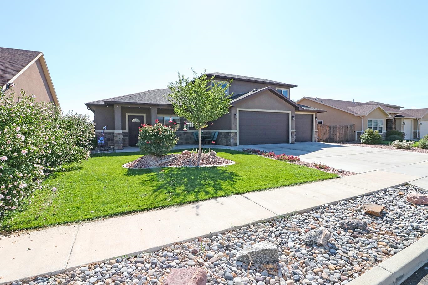 Don't miss out on this wonderful Fruita home that is in a great location & ready for you to call it home!! This beautiful 4 bed, 3 bath, 3 car garage home has an open kitchen, living & dining area & just over 1800 sq ft. of living space. Main floor master suite w/ 5 pc bath & walk in closet. Additional bed & bath on main level & 2 beds & bath upstairs. Garage has TONS of storage & a workout area. Outside you will find a fully fenced yard w/ mature landscaping & sprinkler system. Walking distance to Fruita Middle School & Fruita Monument High School. Close to downtown & minutes from shopping & I-70. Come take a closer look & make this one your new home!!