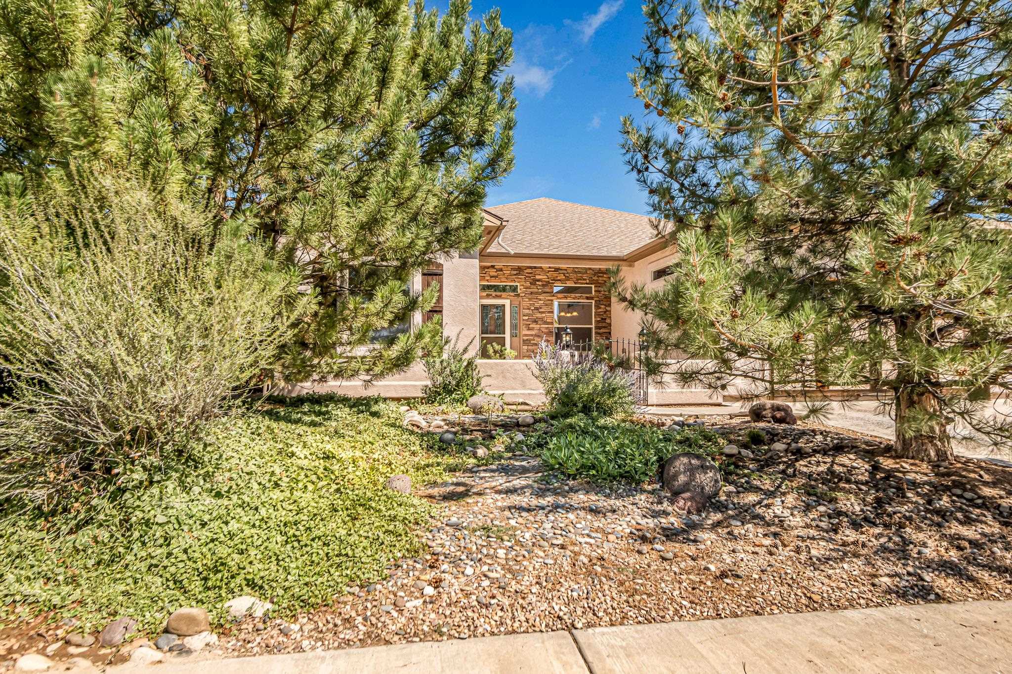 Beautiful 3 Bedroom 2 Bathroom home in the heart of Fruita. This home backs up to a large greenbelt. Close to schools, walking trails and other recreation that Fruita has to offer! This home features a beautiful kitchen including up-dated refrigerator & dishwasher that opens up into a huge living area with a gas fireplace to cozy up! Master bedroom has  5 piece en-suite bathroom including a garden tub to relax and soak. The second bedroom is an en-suite addition to the master as well. Cleaning is made easy with a Beam central vacuum! Laundry room is equipped with a mudroom sink for clean up as well. Central air conditioning and a April Aire Humidifier built into the HVAC system. Enjoy relaxing outside under covered patios, one of which has an outdoor fan! {wired with a separate hot tub panel} Xeriscaped yard for low maintenance. New water heater & garage door opener as well.Schedule a showing today!