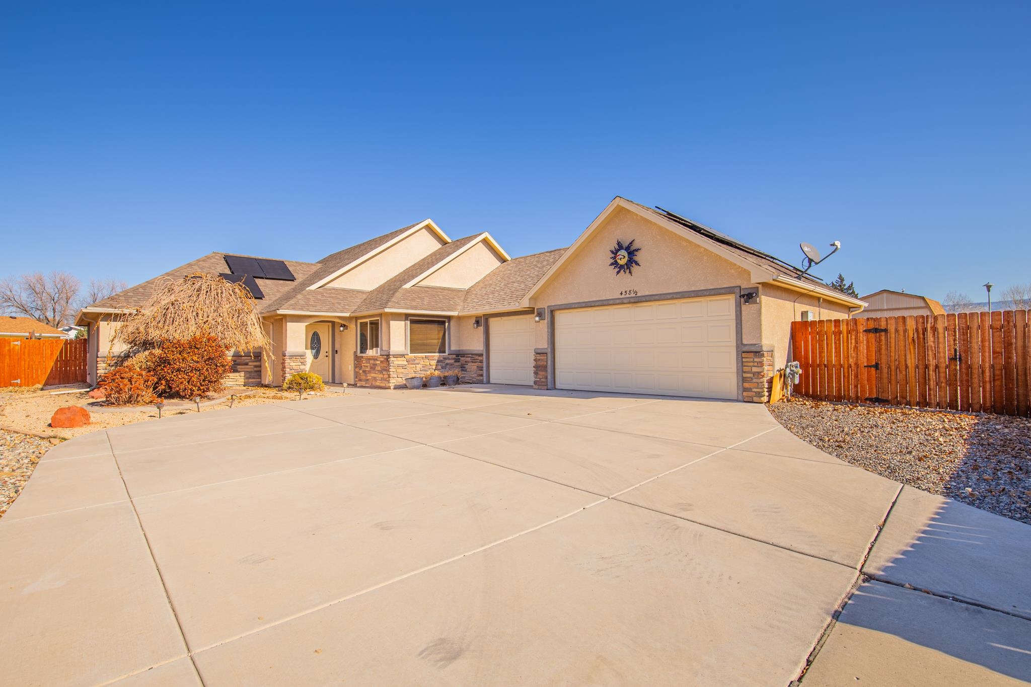 This spacious 4-bedroom, 2 full bath home offers plenty of room with ample storage throughout. The well-maintained yard has a covered patio that is perfect for relaxing in the shade. There is also RV parking, however a double gate would need to be installed. Additionally, this property features energy-efficient solar panels, helping to reduce energy costs.