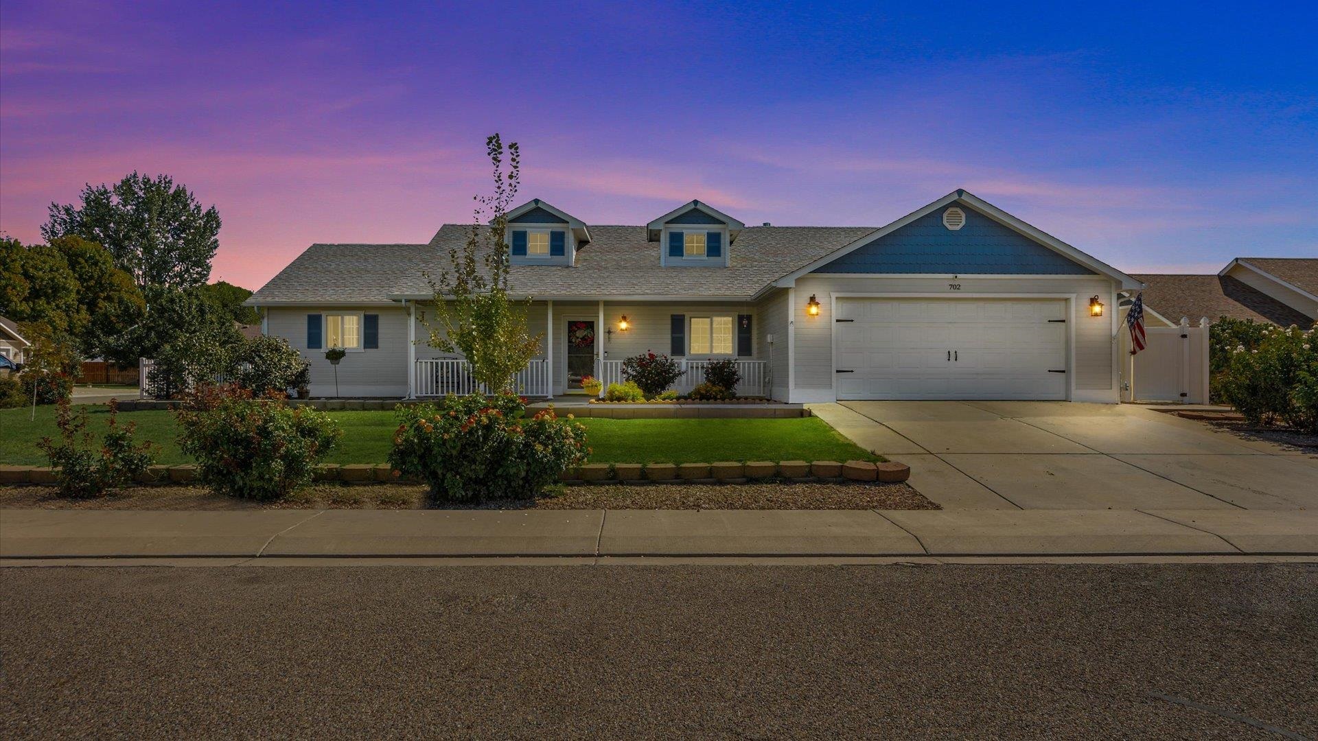 Back on the market at no fault of the Seller! This charming ranch-style home, located on a cozy corner lot in Liberty Glen, offers a blend of modern updates and timeless style. The open and inviting floor plan welcomes you with vaulted ceilings and a sleek two-tone paint scheme. The living and dining areas flow seamlessly, with luxury plank flooring providing both sophistication and durability. Natural light pours in through the sliding glass doors, leading to the private backyard space, perfect for indoor-outdoor living. The chef's kitchen is a standout feature, boasting white shaker cabinets, granite slab countertops, an under-mount sink, and a custom tile backsplash. Stainless steel appliances and a breakfast bar with additional seating make this space ideal for both cooking and gathering. The adjacent casual dining area offers the perfect spot for entertaining and family meals. The primary suite is a private retreat, complete with plush carpeting, an en-suite bathroom featuring granite-topped dual vanities, an oversized walk-in closet, and a convenient tub/shower combo. Two additional bedrooms provide ample space and storage, and a remodeled full bathroom adds to the home's appeal. A sliding-door linen closet offers even more storage options. Outside, the privacy-fenced backyard includes a large open patio, perfect for enjoying the beautiful Grand Valley climate. Two outdoor sheds offer added storage, while a separated garden area with split-rail fencing provides a perfect space for gardening enthusiasts. Situated in the rapidly growing Fruita, CO, this home is close to world-class hiking and biking trails, downtown events, entertainment, and some of the best dining in the area. Don’t miss the opportunity to make this beautiful home yours—schedule a showing today!