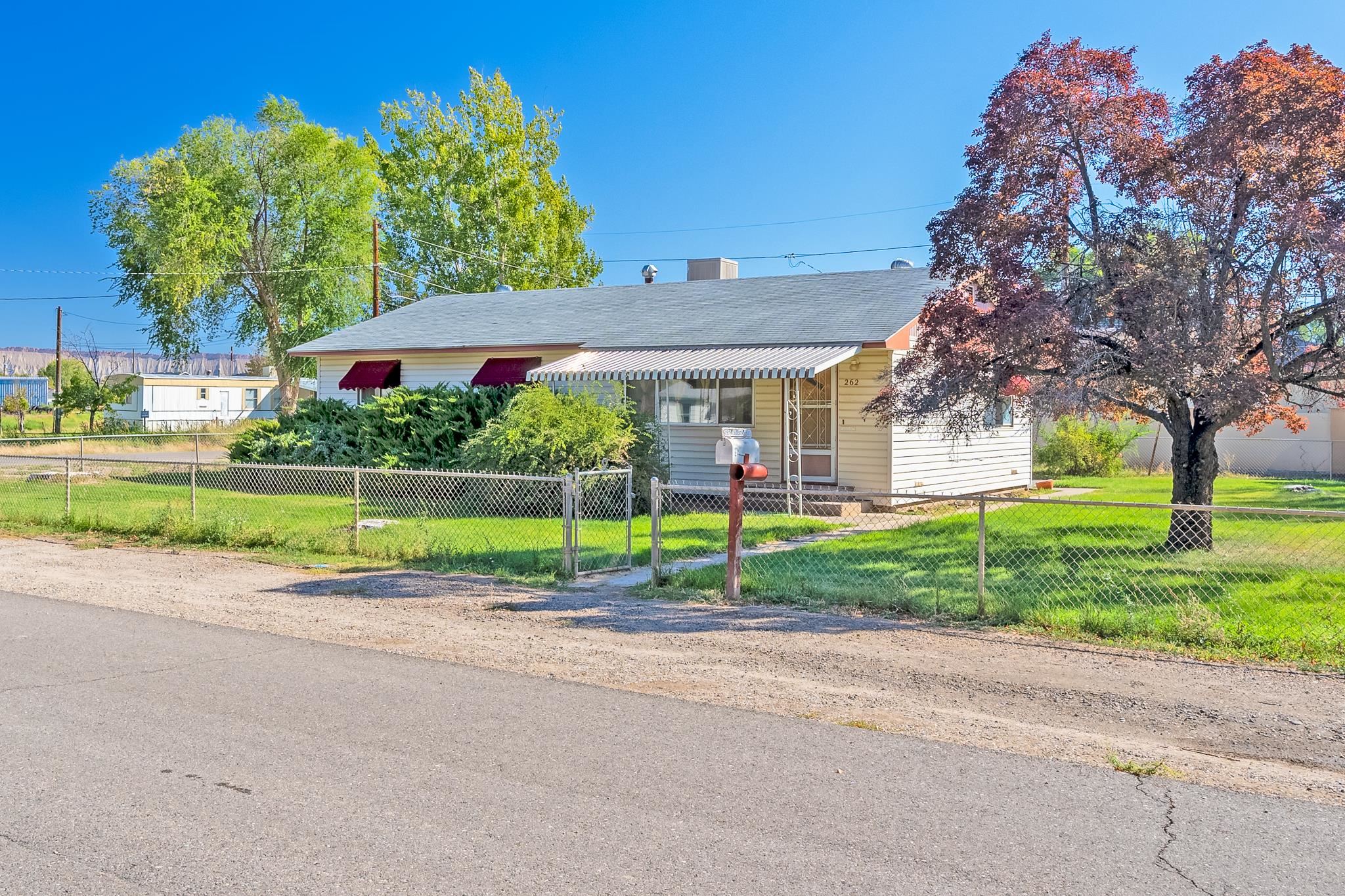 Ready for a new owner! This 3 bed, 1 bath midcentury bungalow sits on a large corner lot with irrigation and sprinkler system, a detached garage with plenty of storage and tons of original charm!