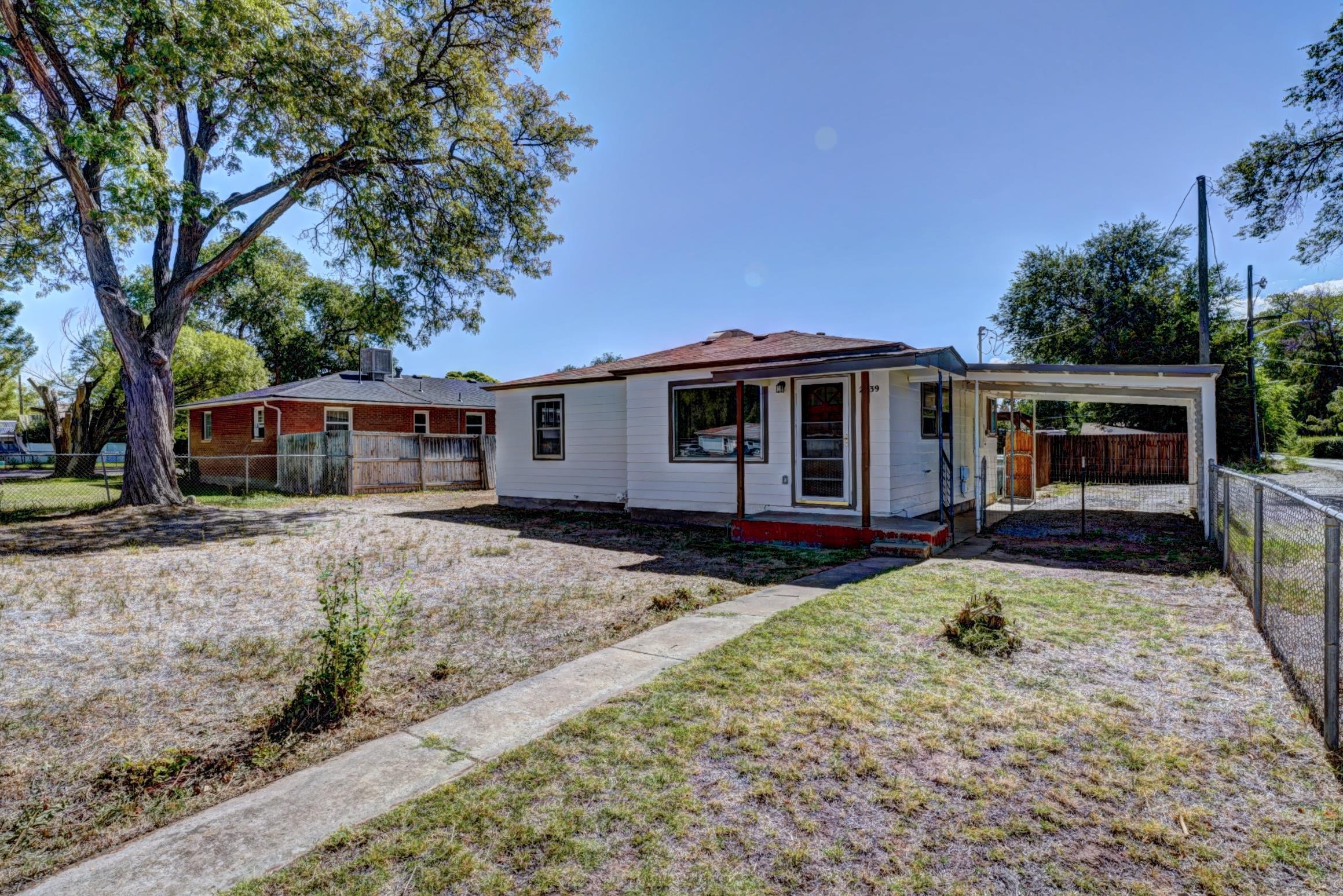 Discover this beautifully remodeled 2-bedroom, 1-bathroom home, offering 859 sq ft of living space with spacious bedrooms, tons of natural light, and gorgeous hardwood floors. Situated on a large corner lot, this property provides the perfect blend of comfort and great potential.   Key features of this property include: Fully remodeled kitchen with stainless appliances, gorgeous quartz countertops, and new cabinets.  A beautifully renovated bathroom featuring elegant fixtures, tile, and contemporary finishes. Original hardwood flooring throughout the home, fresh interior and exterior paint, and blank slate yard.  This property is conveniently located near off Unaweep with easy access to local amenities, Eagle Rim park, and schools. Embrace the opportunity to make this charming home your own!