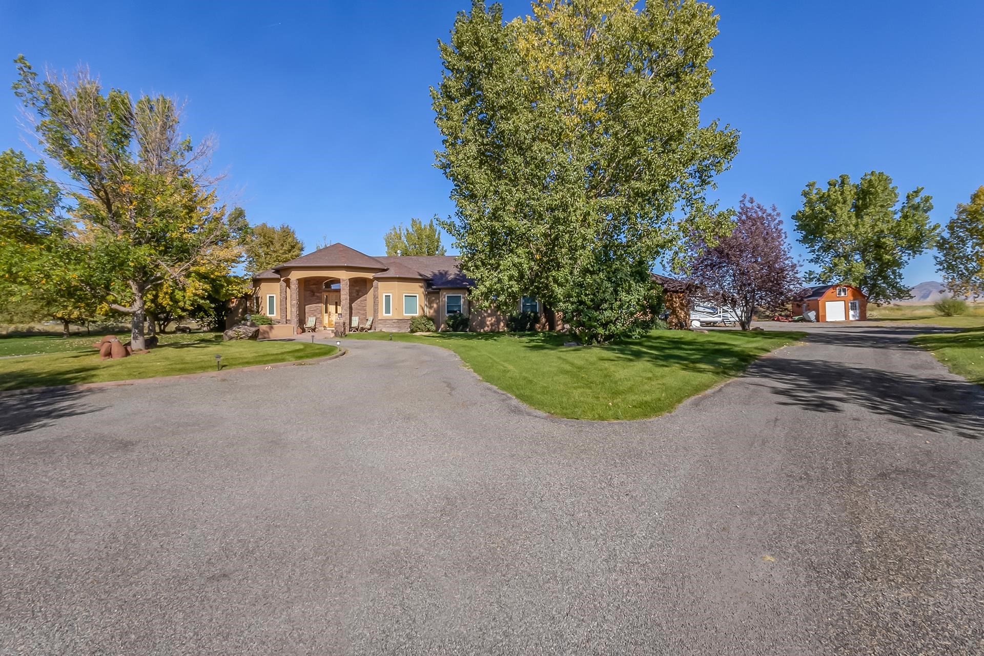 Excellent North location with 160 Degree Views, on under 4 acres, with a back yard water fall.  This custom home offers a unique feel, with an ease of movement from the minute you step into the inviting foyer, which holds a unique quality for any mood.  The updated kitchen offer's the open concept that is inviting for gatherings to move freely around the large living space and into the unique bar.  The family/game room utilizes French doors to a covered patio with easy access for fun in the salt water above ground pool.  The outdoor space offer's built in counter's for ease of bar-b-que afternoons and adjoining access to the kitchen. The garden enthusiast will be enriched by the large, above ground planters of which are plenty.  The beautiful craft of large bedrooms and the double headed showers, offer's relaxation throughout this split floor plan master piece.  Horses are allowed with easy access to trails and open space.