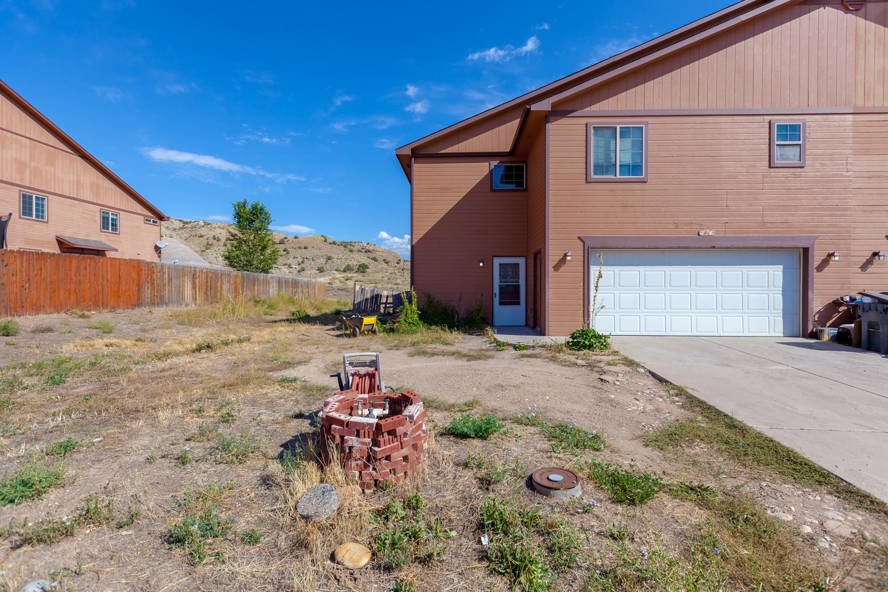 Welcome to this spacious and inviting 2-story townhome nestled in the peaceful, small community of DeBeque, Colorado. With 3 bedrooms and 2.5 baths, this home offers comfortable living and plenty of room to grow. The large master bedroom is a standout feature, providing ample space for relaxation and privacy. The two additional bedrooms are perfect for guests, or a home office.  The open layout enhances the overall spaciousness of the home, making it ideal for entertaining or simply enjoying quiet moments. The yard offers endless potential for gardening, outdoor activities, or creating your own personal oasis. Plus, with irrigation water available for a small fee, maintaining a lush and vibrant yard has never been easier. Located in the heart of DeBeque, this townhome combines small-town charm with modern living conveniences. Don’t miss the opportunity to make this lovely home yours!