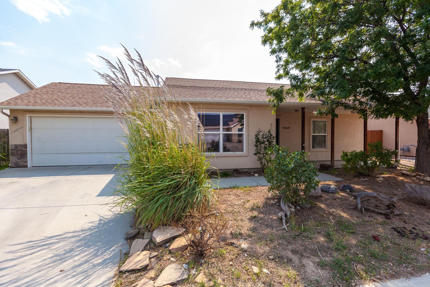 Ranch style home with owned solar panels. Oversized primary bedroom with 5-piece bathroom and walk in closet. Kitchen includes 2 eating areas plus bar height seating. Covered front patio and uncovered back patio with fenced backyard and shed.