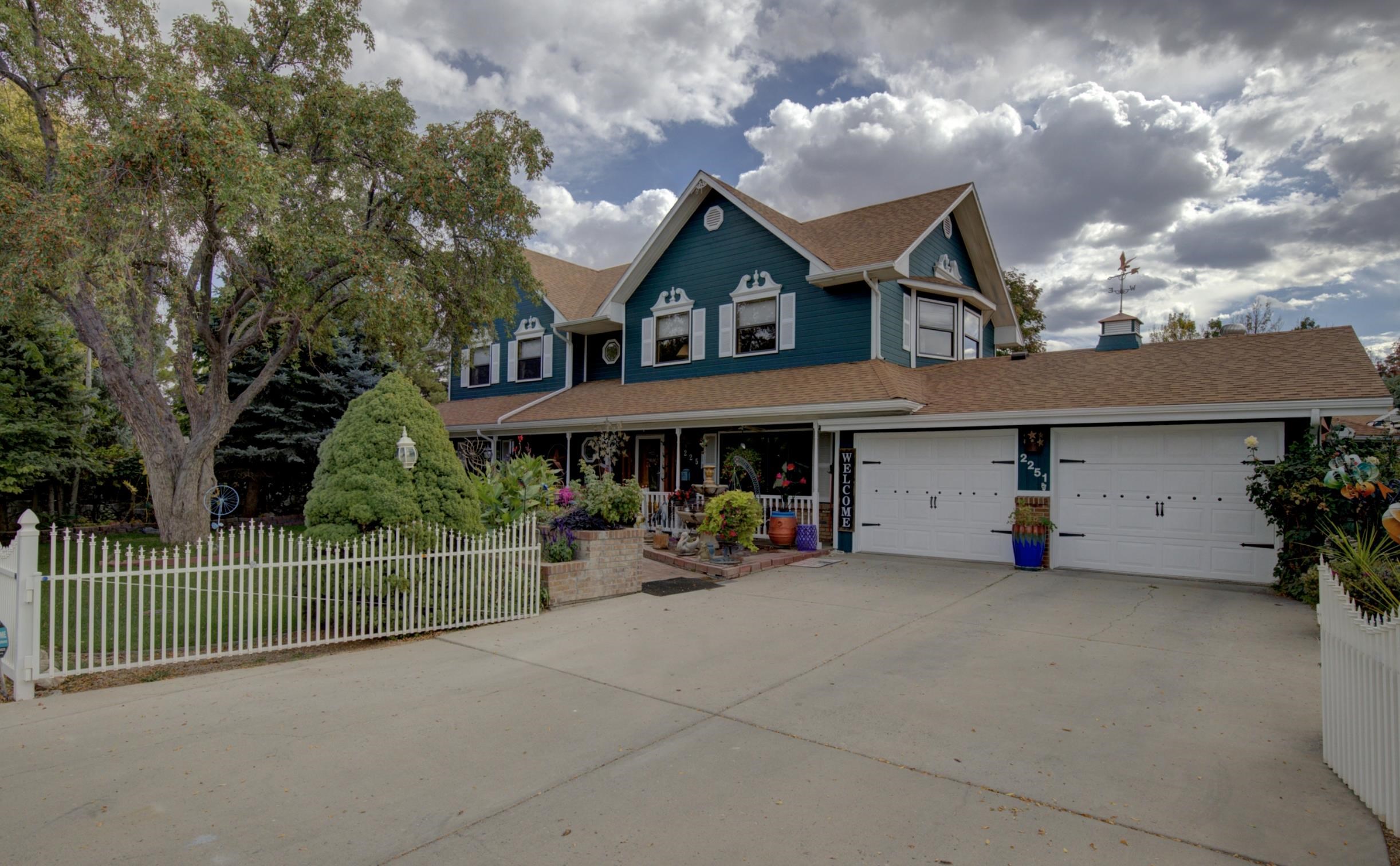 This impressive custom 4 bed, 4 bath, 6.5 car garage Farmhouse on .51 acres includes 2 primary suites, office, game room, movie room, living & family room and more! This 2 story home w/basement includes 2 primary rooms, located on each the main floor and upstairs, 2 laundry rooms, 5 living spaces (office space, game room, movie room, family rooms, man cave... the options are endless), 2 fireplaces, more storage space than you can think of and more. Throughout the home you will find gorgeous hardwood floors and ceramic tile flooring, oak trim, custom oak front door, updated 2018 kitchen with Knotty Hickory soft close cabinets, granite countertops, 2 pantries, new appliances, commercial size stove top and range, recently updated bathrooms and tile work. This home was made to entertain! The outside includes attractive and well maintained landscaping, a deck from the upstairs primary room with commercial grade stair coverings, built-in bbq area, pergola, hot tub, large yard with garden shed, detached 2 car garage or workshop, RV parking, 2 entry gates, outside lighting, new polished brick, and 2 attached car garages with a total of 6.5 car spaces. Don't let this 1964 home fool you, this home has been completely restored in 2005 with all new plumbing, electrical, studs, sheet rock and more. 2 central air units, 2 furnaces, 2 hot water heaters are new within last 2 years, new roof within last 3 years. You have to see it in person to cherish the quality this home provides!