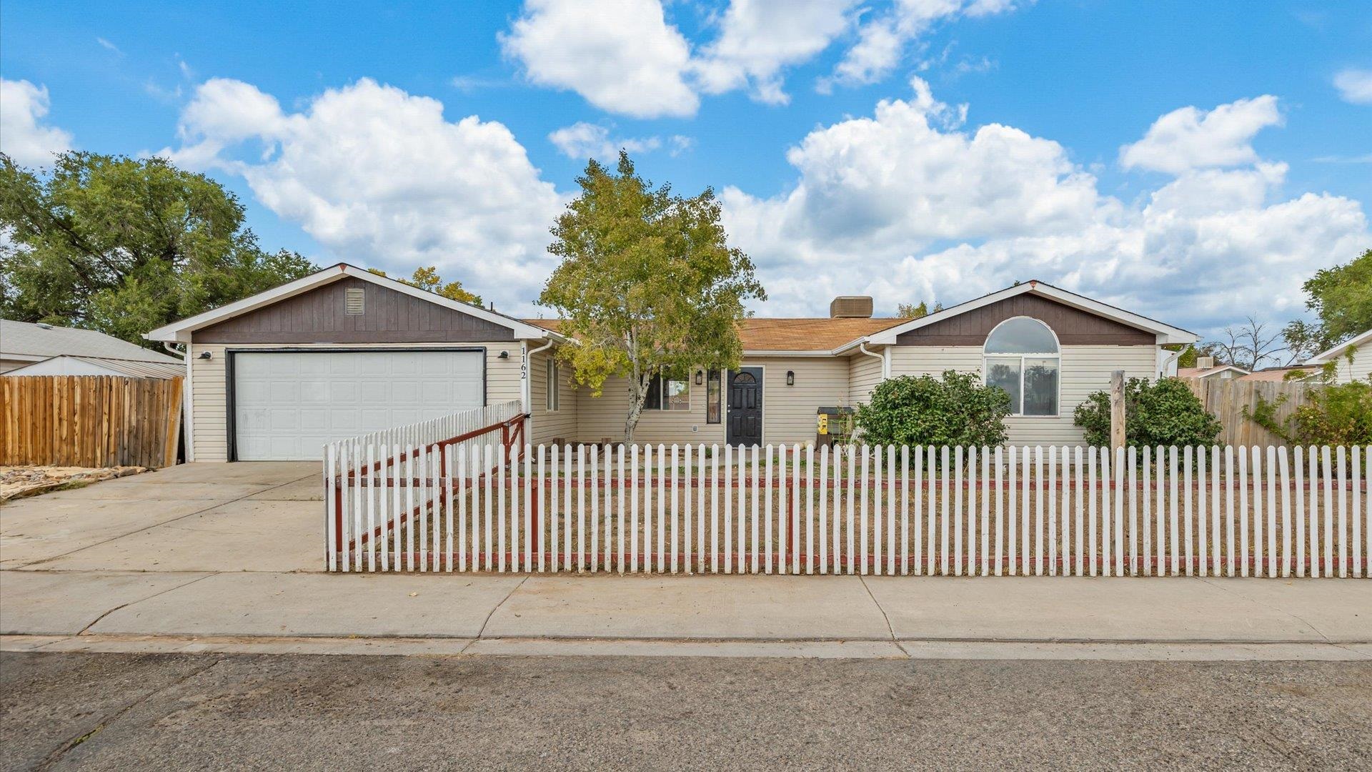 This 3-bedroom, 2-bath home is conveniently located in the heart of Orchard Mesa, close to schools, grocery stores, a bowling alley, and more. Inside, you'll find an open kitchen and dining area and a large living room, providing plenty of space for relaxing or entertaining. The garage was converted into two additional rooms by the previous owner and can be converted back into a garage if new owners desire to do so. This is a great opportunity in a desirable location!