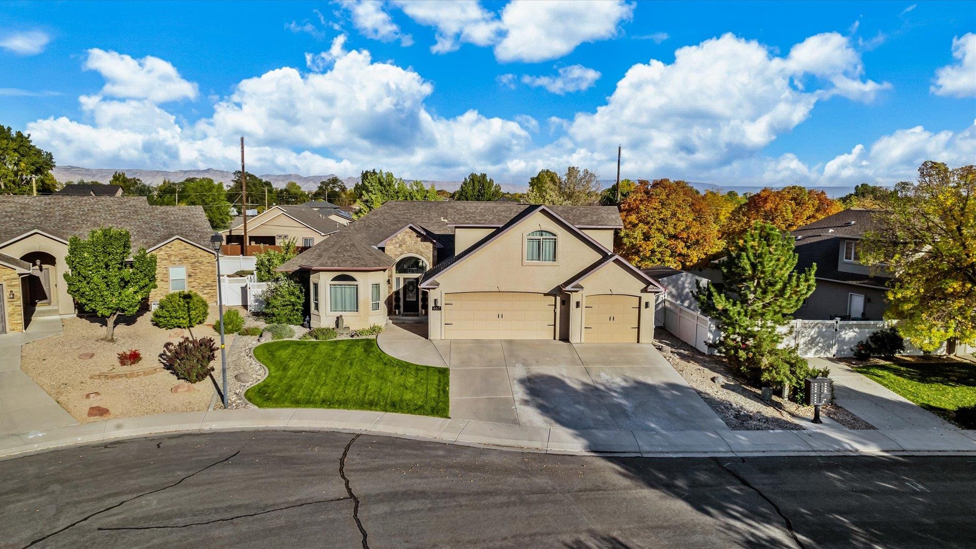 Step inside this beautiful 5-bedroom, 3-bathroom home in Fruita sitting in the coveted Elmwood Estates subdivision!  This unique, 2,835 square foot residence, offers radiant heat throughout, a brilliantly laid out split bedroom floor plan with a gorgeous primary bedroom suite. The primary bathroom has been completely remodeled with a soak tub, heated towel racks and an oversized walk-in rain shower.  Enjoy music both inside and outside as you entertain guests with your surround sound speakers. What would you do with the spacious bonus room above the 3-car garage?  Game room maybe or family room? You decide! Take advantage of the 4-person hot tub, included with the house, in the privacy of your backyard, or take a short stroll to everything that downtown Fruita has to offer.  Availability in Elmwood Estates is highly desired and is few and far in between, so you are going to want to act fast!