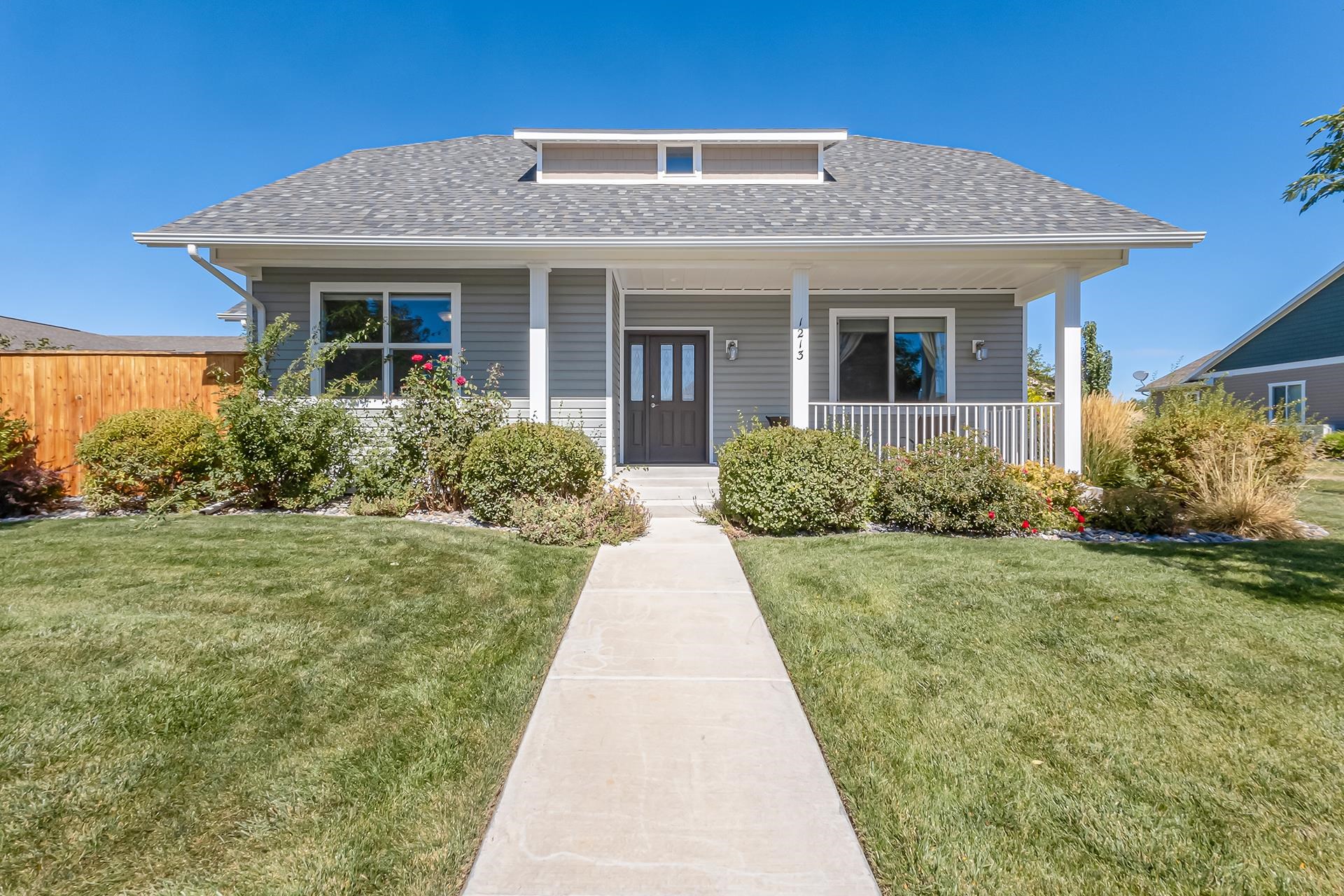 This is the Catalpa Plan, one of the most popular floor plans in this 55+ community located in North Fruita. Entry opens up to living room with gas log fireplace, and large window overlooking privately fenced patio.  Dining room off living room with bay window and access to patio.  Kitchen has ample Maple Ivory cabinets, all appliances as well as washer and dryer.  Primary bedroom will fit king bed, plan modified to access laundry and kitchen as well as front hallway.  Primary bath with walk-in closet, double vanity, one built in medicine cabinet and walk-in shower with seat.  One guest bedroom overlooks front covered patio and the other is set up for either bedroom/office/hobby room with access to private patio.  LVP flooring throughout home.  Private patio has area for pet and hot tub is included.  Buyer to verify all information as it is subject to change/error.