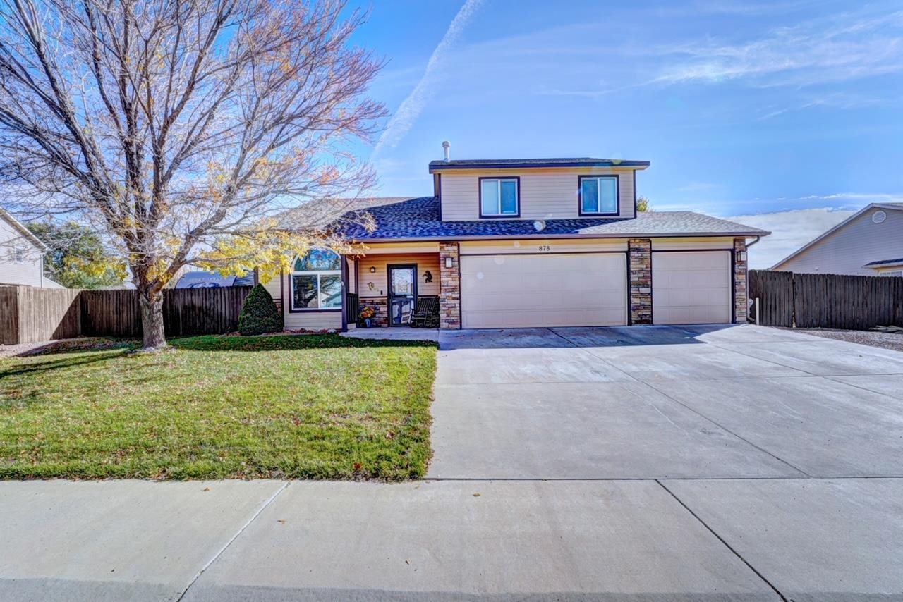 Get ready to fall in love with this stunning 4-bedroom, 2.5-bath home in a highly desirable Fruita neighborhood, close to Prospector Park! Qualifies for USDA 100% loan! The heart of the home is the spacious kitchen, complete with heated tile floors, stainless appliances, and both a bar and eat-in area. For special occasions, there’s a formal dining room, and you’ll love the warmth of two cozy fireplaces in the large living and great rooms. The upstairs baths also feature heated tile floors. Outside, enjoy a beautifully landscaped yard with raised garden beds, a privacy fence, RV parking, and a covered patio with a pergola that is perfect for entertaining!  Solar panels are owned.