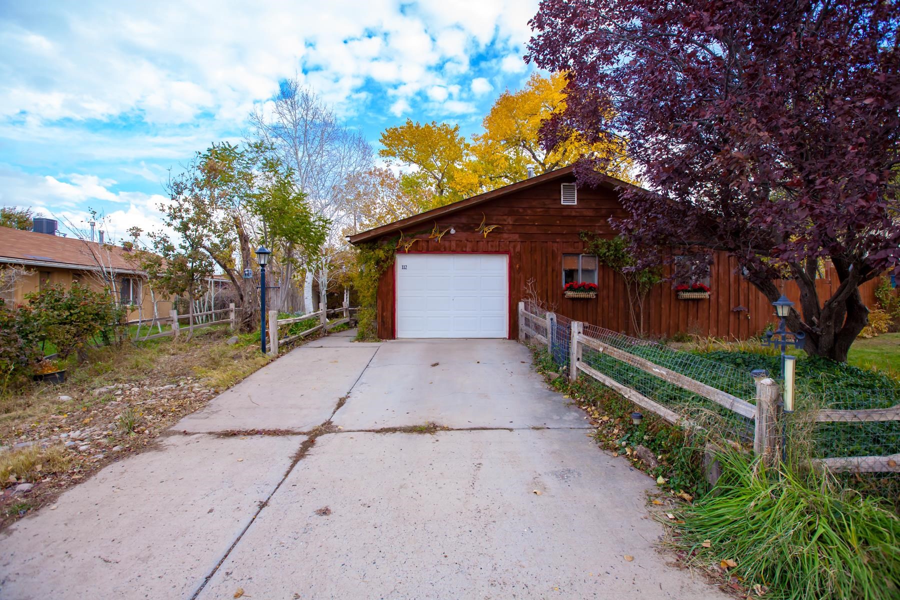 Welcome home to this delightful 3-bedroom, 1-bath house that combines the charm of country living with the convenience of nearby shopping amenities. Located in a quiet neighborhood with no HOA, this property offers flexibility and freedom to make it your own. Inside, enjoy the cozy sunroom with a pellet stove, perfect for year-round comfort while taking in views of the beautiful garden. Outside, the spacious yard is a true oasis, ideal for relaxation and outdoor gatherings. This home provides just the right amount of room for those who love a touch of adventure. This is your chance to enjoy a peaceful retreat that’s close to everything you need—don’t miss out on making it yours!