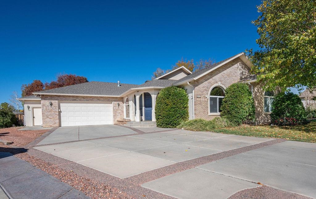 Step inside this beautifully renovated ranch style home in a much desired neighborhood.  The main living area features newer Luxury Vinyl Plank Flooring in the kitchen and dining area and newer carpet in the step down living room as well as throughout the home. In the living room you will also find vaulted ceilings and a gas log fireplace.  The many windows creates an abundance of natural light in the main living space.  The kitchen has been tastefully remodeled with beautiful cabinetry and backsplash, quartz countertops, stainless steel appliances and walk-in pantry.  Direct access to a large patio and open concept living make this home an entertainers dream.  The home features 3 bedrooms and an office with a split bedroom floorplan.  The generous sized main bedroom offers direct patio access, and a large 5 peice en-suite with newer vanity, marble countertops, double sinks, garden tub, step in shower and walk-in closet.  The 2 car garage boasts an extra room perfect for crafting, a workshop or extra storage.  Outside you will find a large back patio, mature landscaping, storage shed and spacious yard that backs to open space providing extra privacy.  This home has so much to offer in a great location!  Get inside today!