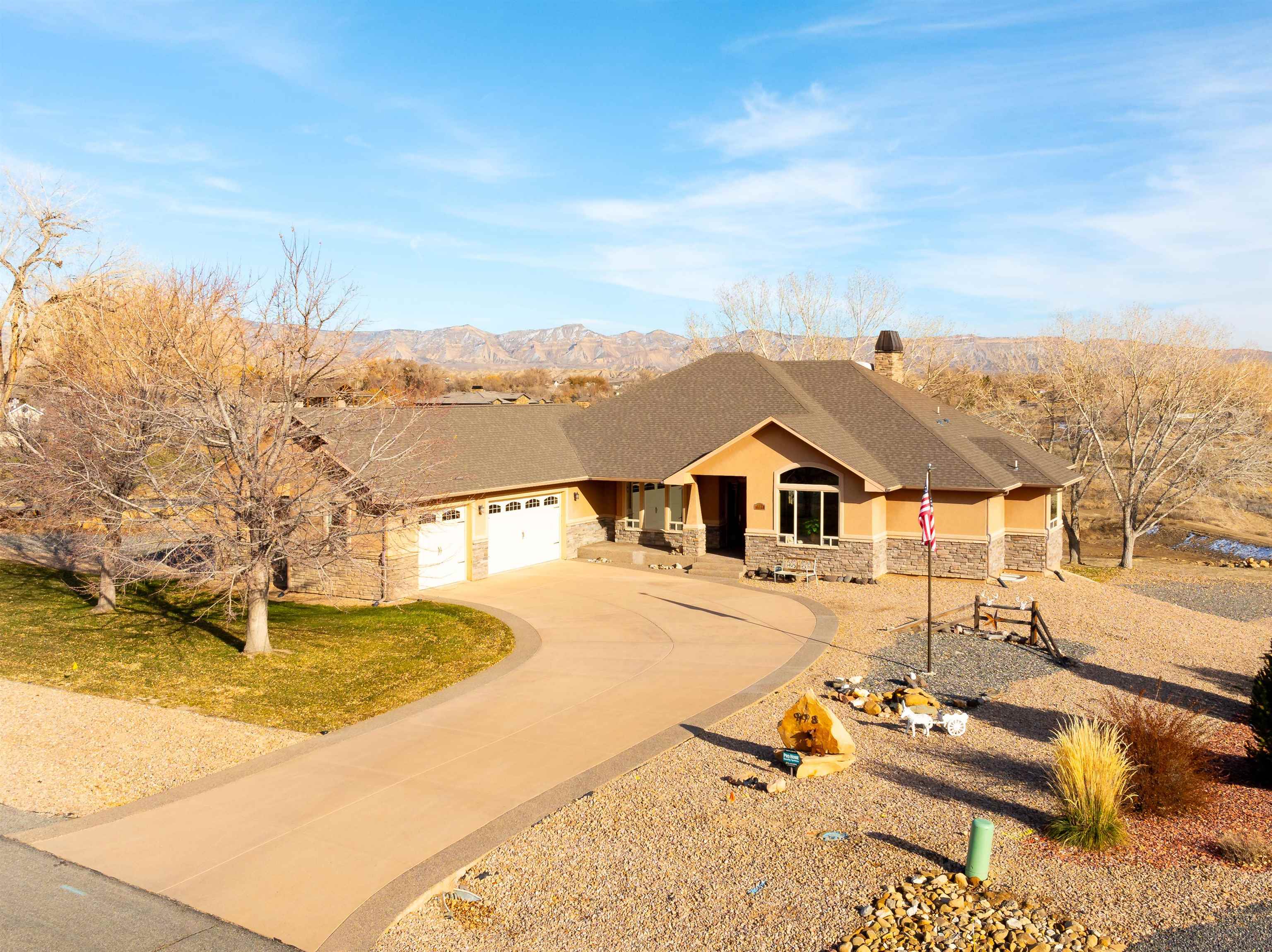 Welcome to this beautiful custom designed and built ranch style home with full walk-out basement perfectly situated on over 2 acres taking advantage of the breathtaking views. Soaring vaulted ceilings and an abundance of natural light adorn the living area. This thoughtfully designed home boasts custom finishes throughout, creating a blend of elegance and comfort. The main level features an inviting open-concept living space, ideal for entertaining or simply relaxing. The primary suite, conveniently located on the main level offers a private retreat with picturesque views. The full walkout basement provides endless possibilities and storage opportunities perfect for gatherings, guest space, theatre and a great space for a home gym. Schedule your private showing today and experience the charm of this exceptional home.