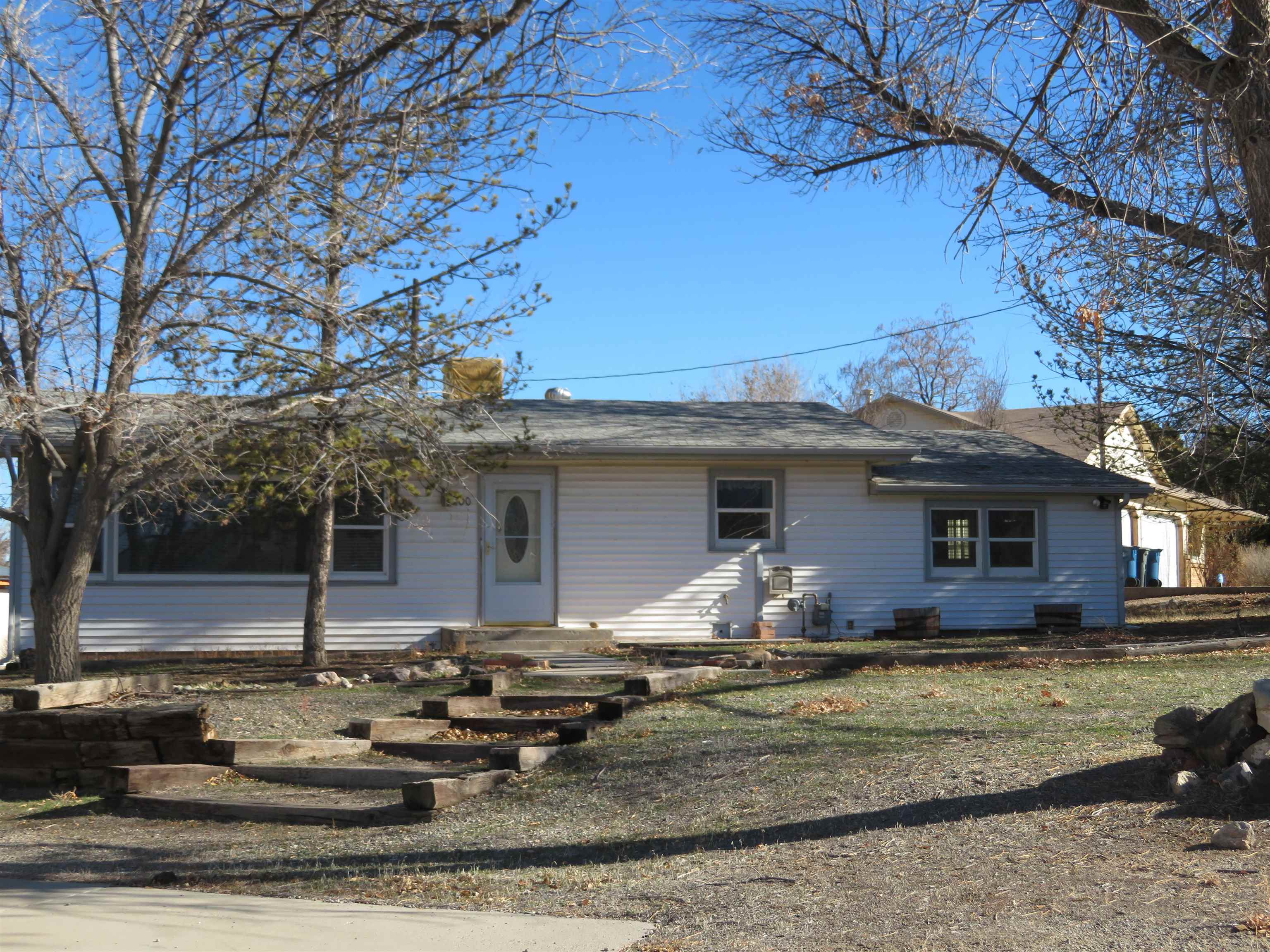 Charming 50s home- Nestled in the Redlands on 1 acre. The floorplan is pretty open and lots of natural light comes in. Breathtaking views off your front patio and out the large living room window. It is a split bedroom floorplan. The original wood floors are gorgeous. Well cared for, but needs your personal touch. The 4th bedroom downstairs could be a bedroom or make it a family room or studio. The garage is a two car garage door, but its almost a 3 car garage- room to make a workshop (25x30). Plenty of room for all the toys, RV's, or have a couple horses. The hot water heater and furnace is newer. Buyer to verify all information, subject to error.