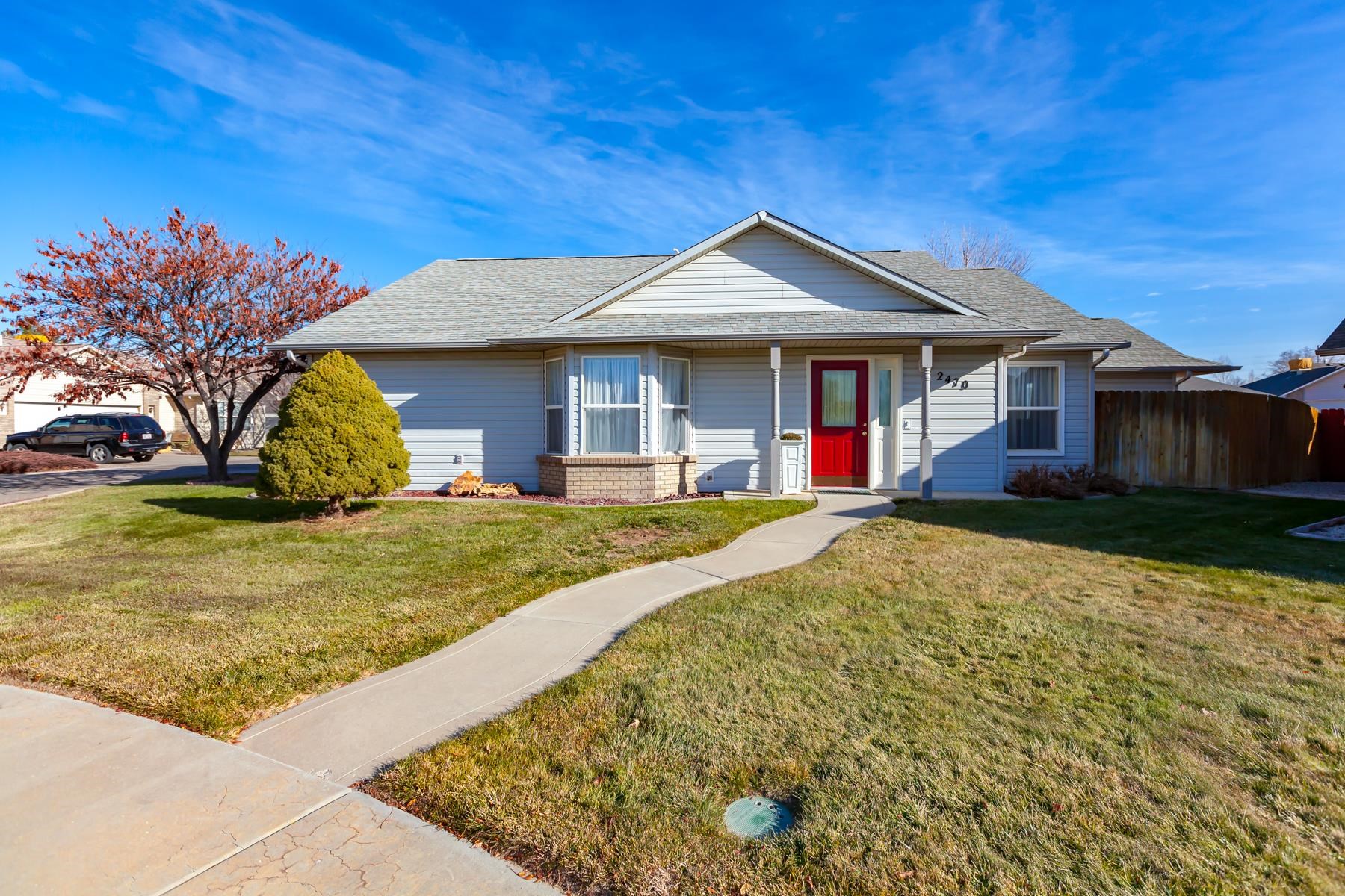 Beautiful low maintenance home in the North area. Step into a welcoming and comfortable space, featuring new interior paint, new flooring, and a new On Demand water heater & boiler system. The living room is bright with sliding doors out to the patio. The kitchen holds a breakfast bar, built in spice racks and under counter lighting. Plenty of room with 3 bedrooms and 2 baths. The shelving and workbench stay in the 2 car garage and there is a fenced yard out back. Everything you want for low maintenance living.