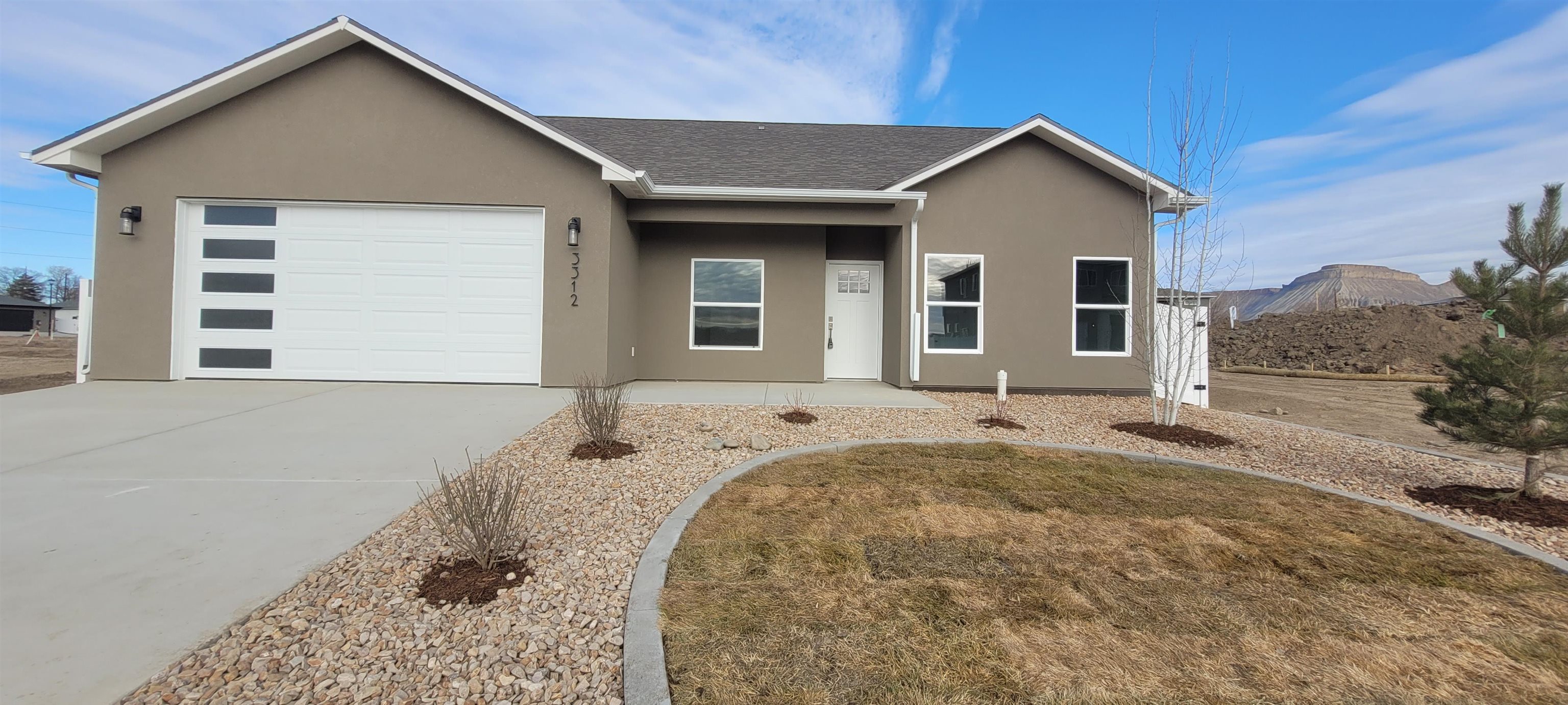 USE CRA FINANCING TO POTENTIALLY SAVE HUNDRDS OF $$/ MO ON PAYMENTS (CALL FOR DETAILS).  PICK LOT & FLOORPLAN OR GO CUSTOM IN VISTA MESA!! AMAZING Grand Mesa views from this new neighborhood just south east of 33 & E Roads! 3/4 Mile to the Riverfront Trail & 1/2 mile to the new Mesa Co Community Campus with library, early childhood ed center & more . INCLUDES LANDSCAPING & FENCING.  Single level rancher with split floorplan, 1486 square feet, 3 bedrooms, 2 baths, open nice great room area for friends and family gatherings, 2 car oversize garage. MOVE IN READY.