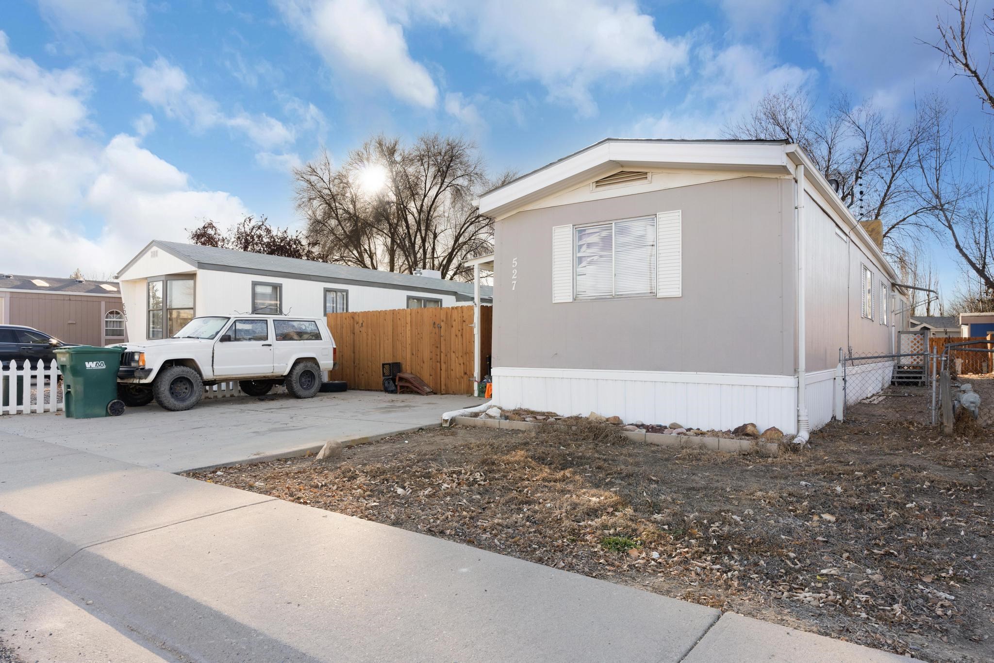 Welcome to 527 Pisces Lane in Holly Park Manufactured Home Park in Fruita CO. This home has been purged to the land (see documents).    This charming residence is priced to sale, featuring 2 bedrooms and 2 bathrooms.  The home offers a comfortable layout perfect for those looking for a peaceful retreat.  Enjoy a spacious living area filled with natural light, a well- appointed kitchen, and a lovely outdoor porch and private yard ideal for gatherings or relaxation.  Located near parks, trails, and the vibrant downtown area, this property combines convenience with a welcoming atmosphere.  Don't miss the opportunity to make 527 Pisces Lane your new home!