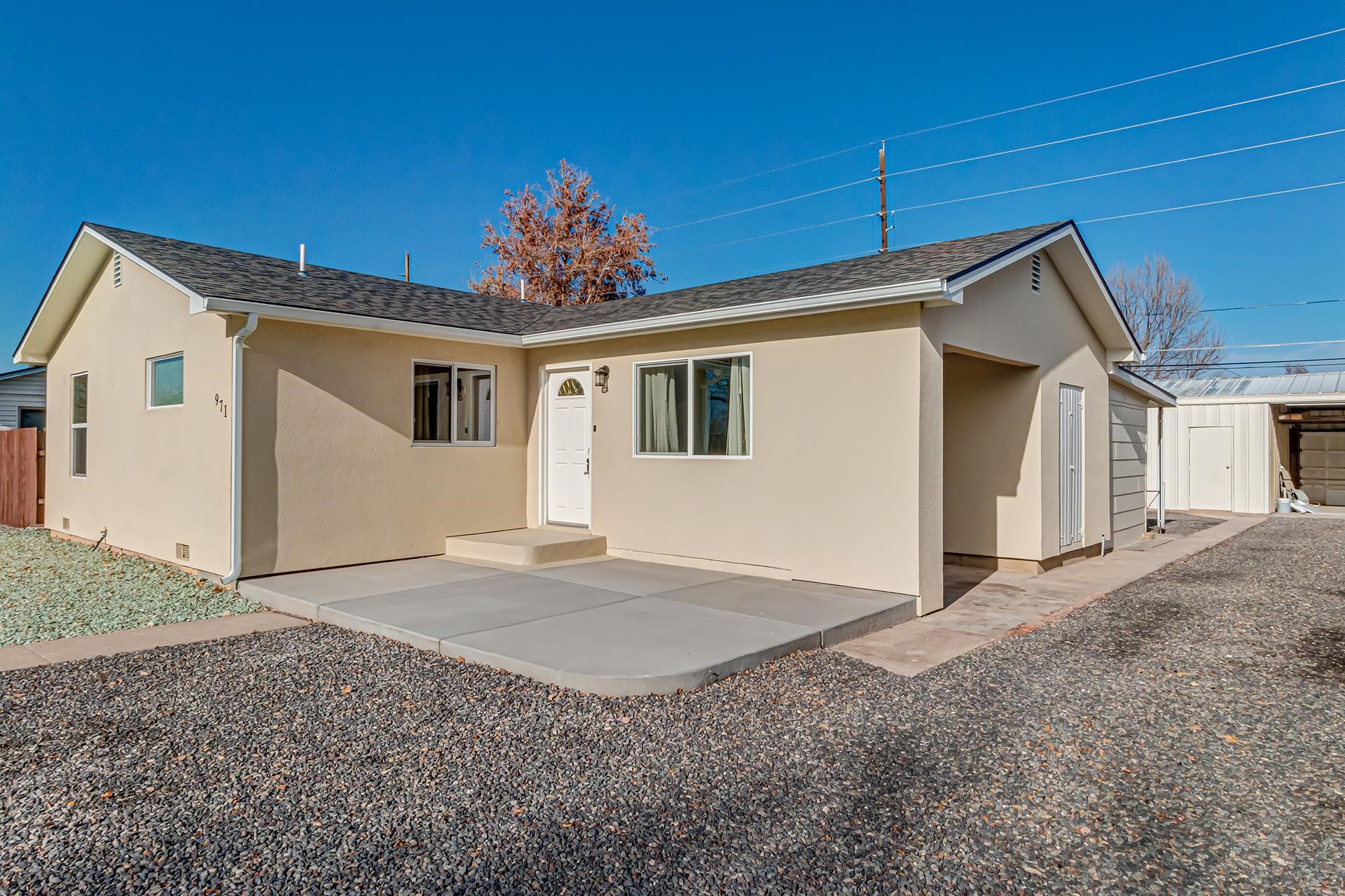 From top to bottom, inside and out, nothing has been left untouched. This 1956 charmer has been updated but still keeps it's original charm. Updated plumbing and electrical. New: Roof, Stucco, Windows, Central Air, Hot water heater, Flooring, Granite Countertops in Kitchen, Cabinets, Hardware and Fixtures, Custom tile, Luxury vinyl plank flooring, Interior paint and MORE! Lots of options with this home. Large gathering? Extend the dining area out into living area- or set everything up in the Family/Flex room. 3 bedrooms, 2 beautiful bathrooms, well appointed kitchen and ample storage with pantry and built-ins. Outside easy care landscape-flagstone patio, RV parking, Carport with alley access. Always wanted a studio, or a place for all your hobbies, maybe an ADU? Potential income producing property. The 50x20 warehouse has a rough in for a bathroom. A true lock and leave-zero maintenance property!