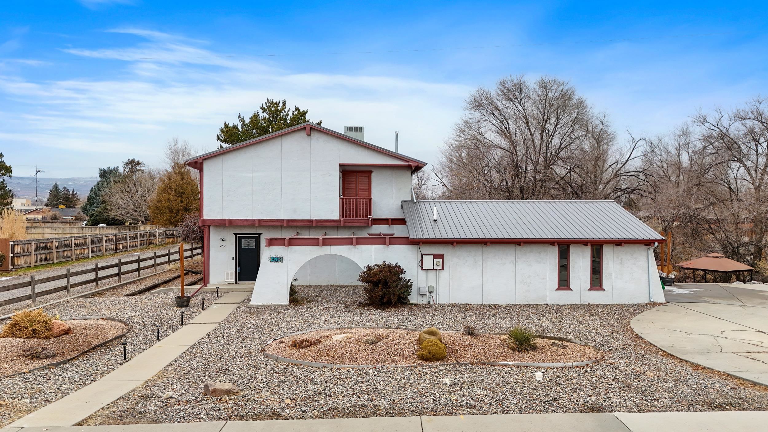 This beautifully updated unique passive solar home located just North of downtown Fruita is a must see.  The passive solar setup has insulated shutters and heat extraction fans to help cut your high heating costs!  Updates include nearly new roof, roof mount air/furnace unit, cooling/heating spit on main floor, stainless steel appliances, hot water heater, farm sink in kitchen, granite countertops, updated bathroom and newer Anderson windows and doors.  This two story home with walk out basement backs to a seasonal creek to provide lots of privacy and space.