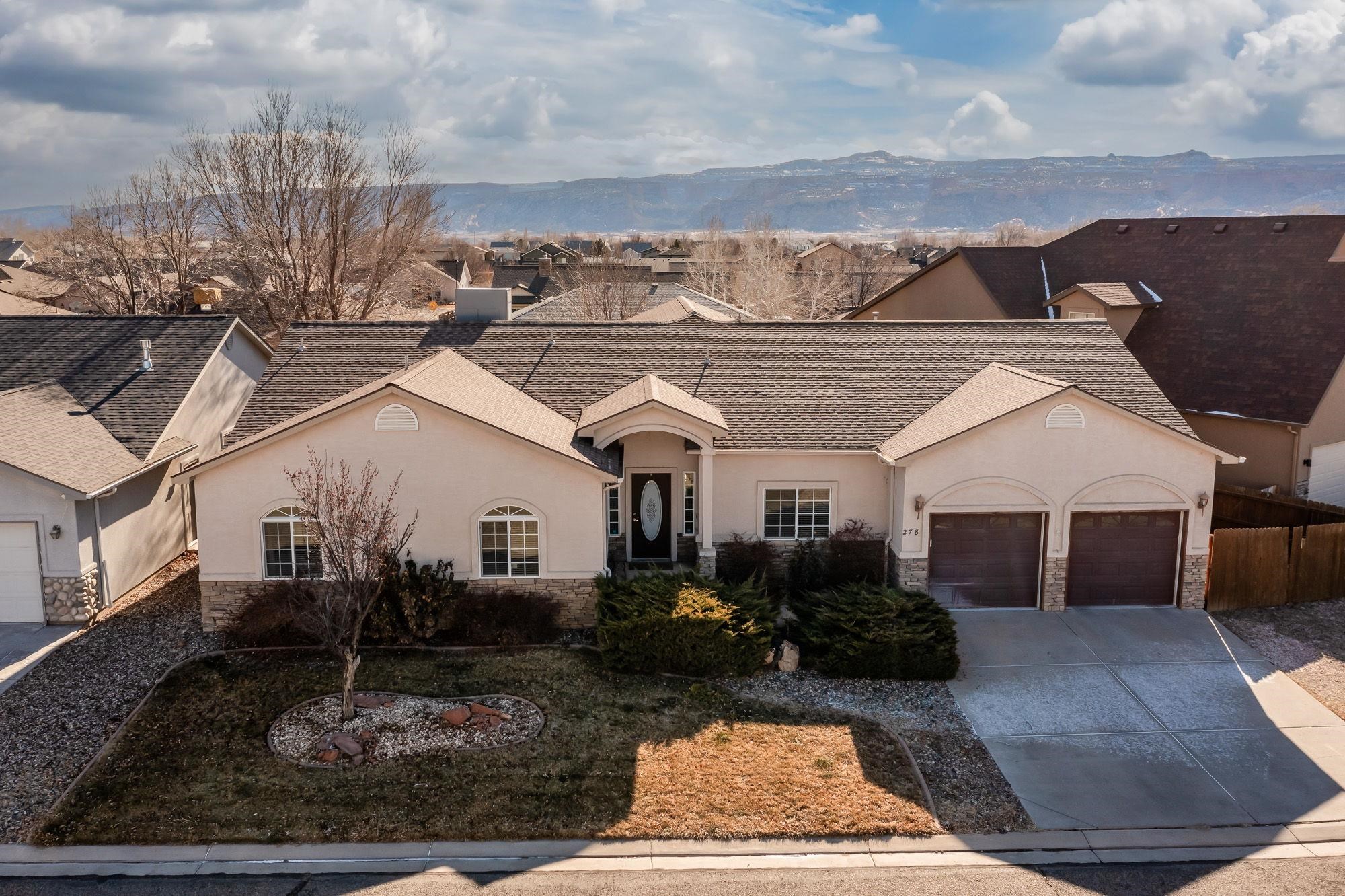 Welcome to this charming home in Fruita, Colorado, offering the perfect blend of comfort and convenience. Featuring 3 spacious bedrooms, an office or formal dining room, and 3 bathrooms, this property is ideal for those seeking both functionality and style. The open and inviting floor plan is perfect for daily living and entertaining, while the well-designed office space offers a quiet retreat for work, or use as a formal dining room. Step outside to the covered back patio complete with a misting system for those hot summer days. The patio is a perfect spot for relaxing or hosting gatherings while enjoying the beautiful Colorado weather. The home is ideally located just minutes from downtown Fruita and local schools, providing easy access to shopping, dining, and recreational opportunities. With its prime location and thoughtful layout, this home is a must-see for anyone looking to enjoy the best of Fruita living!