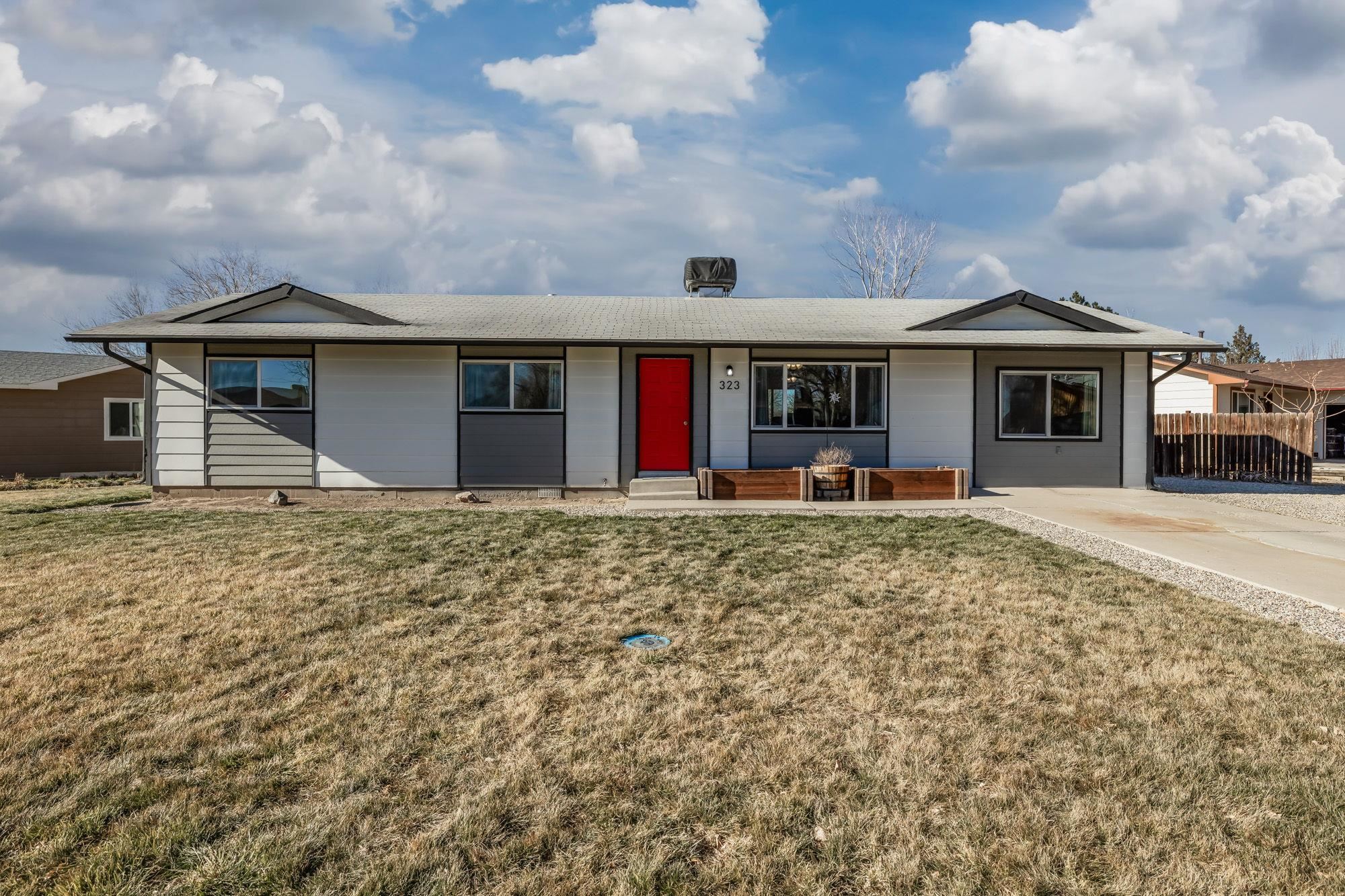 Welcome to 323 E Concord Dr. in Fruita, Colorado! This cozy 4 bed, 2 bath home is back and better than ever with a brand-new second bathroom addition! Inside, you’ll find new vinyl plank flooring, carpeted bedrooms, retextured walls & ceilings that give this home a warm, inviting feel. The kitchen has been updated with new cabinets, countertops and all the appliances are included. Both bathrooms have been redone completely. Other brand new updates include: new low e windows, sliding back door, new trim, interior doors, interior paint AND exterior paint, new lighting & ceiling fans. This home is truly move in ready from top to bottom.  Situated on a spacious corner lot, there's room for your RV and endless possibilities for enjoying your landscaped front yard and entertainment space on the back yard patios.   Located near Adobe Golf Course, grocery stores, hiking trails and just minutes from Downtown Fruita and the Colorado National Monument, this home is move-in ready and perfect for anyone looking to join this vibrant community. Don’t miss your chance to call this charming house your home!