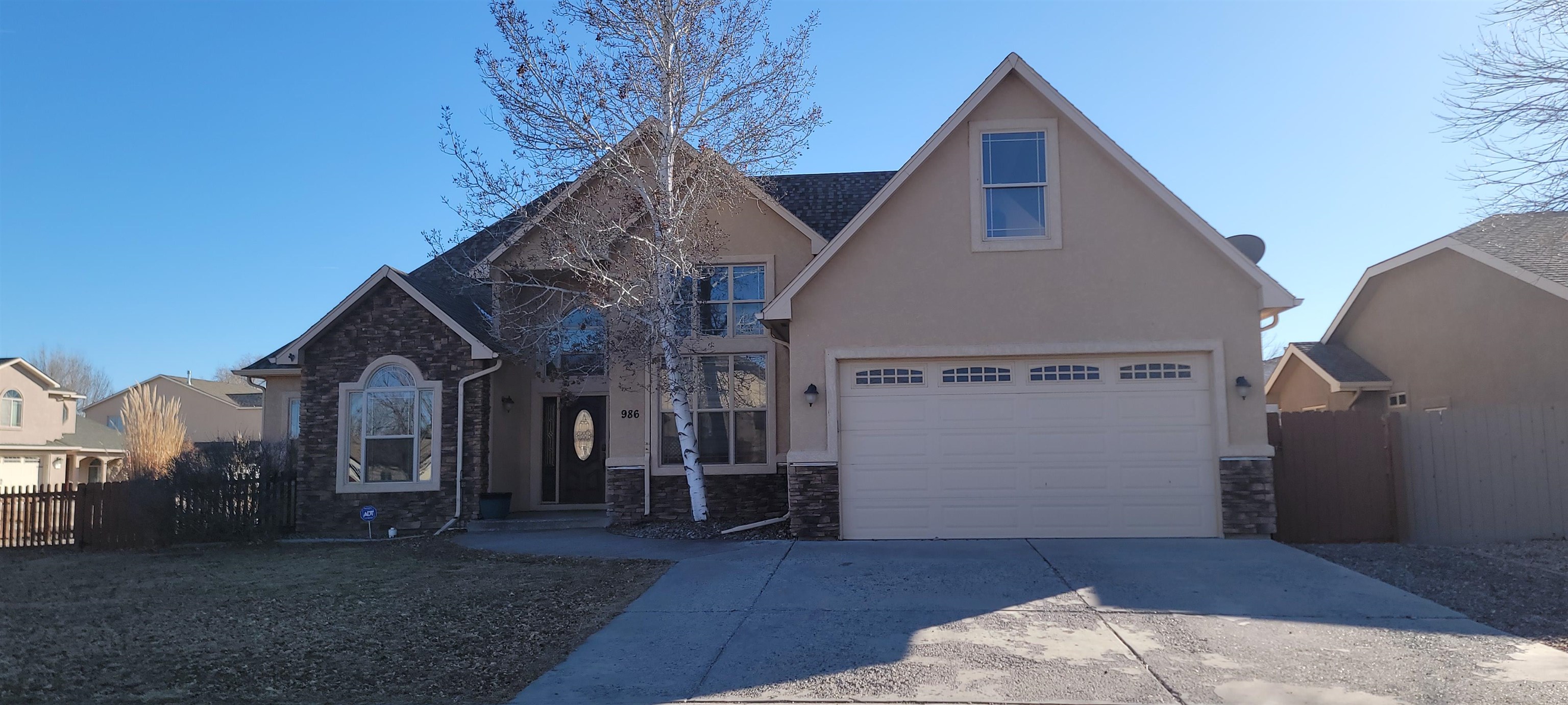 Located in the highly desirable town of Fruita, this beautifully crafted stucco home offers both comfort and convenience. Situated on a corner lot, this 4-bedroom, 2-bathroom home features a spacious, open-concept living, dining, and kitchen area perfect for entertaining. The large, light-filled kitchen boasts stunning wooden cabinets and plenty of counter space, while the adjoining breakfast room offers a warm, inviting spot to start your day. Vaulted ceilings enhance the airy feel throughout.  Upstairs, a versatile bonus room provides endless possibilities—use it as a fourth bedroom, family room, or home office. Step outside to enjoy the sizable backyard deck, ideal for relaxing or hosting gatherings, with a few plant beds to personalize the space.  With a 2-car garage featuring ample storage space and close proximity to Fruita’s charming downtown, you'll be able to enjoy everything this vibrant community has to offer. Bike to local festivals or hit the trails for a ride—Fruita is known for its outdoor lifestyle and bike races that attract visitors from across the country.  Just 15 minutes from the National Monument entrance and Highline Lake, outdoor adventures are always within reach. Plus, access to Grand Junction is only a short drive away, making this home a perfect blend of small-town charm and city convenience.