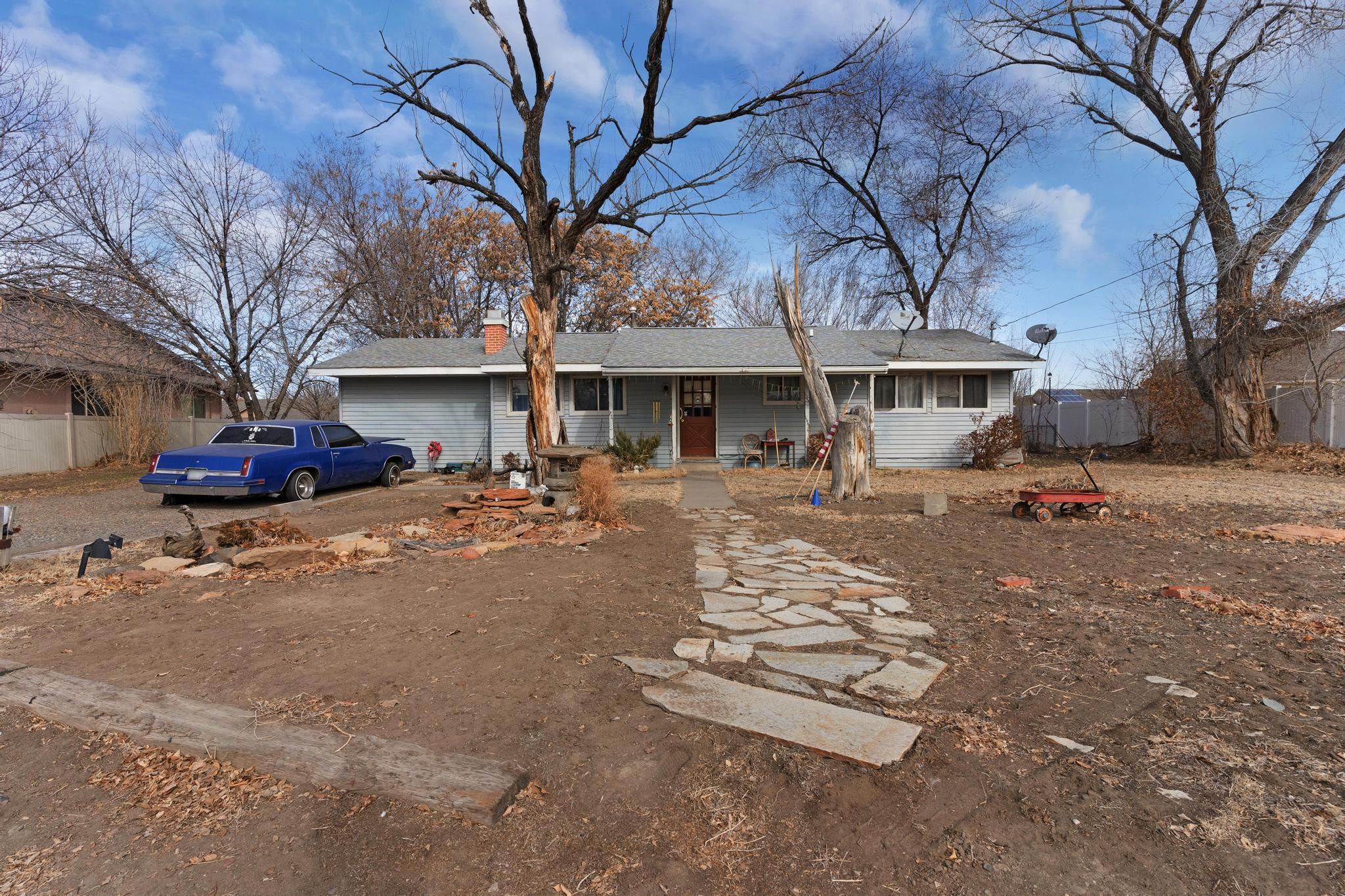 Discover the potential in this charming 2-bedroom, 1-bath home in the heart of Grand Junction! With 1,300 square feet of living space, this home offers a spacious layout with endless possibilities. The large yard provides plenty of room for gardening, entertaining, or future expansion.  Conveniently located near dining, hospitals, and Colorado Mesa University, this property is perfect for those seeking both comfort and accessibility. Whether you’re looking for a starter home, an investment opportunity, or a place to make your own, this one is worth a look!