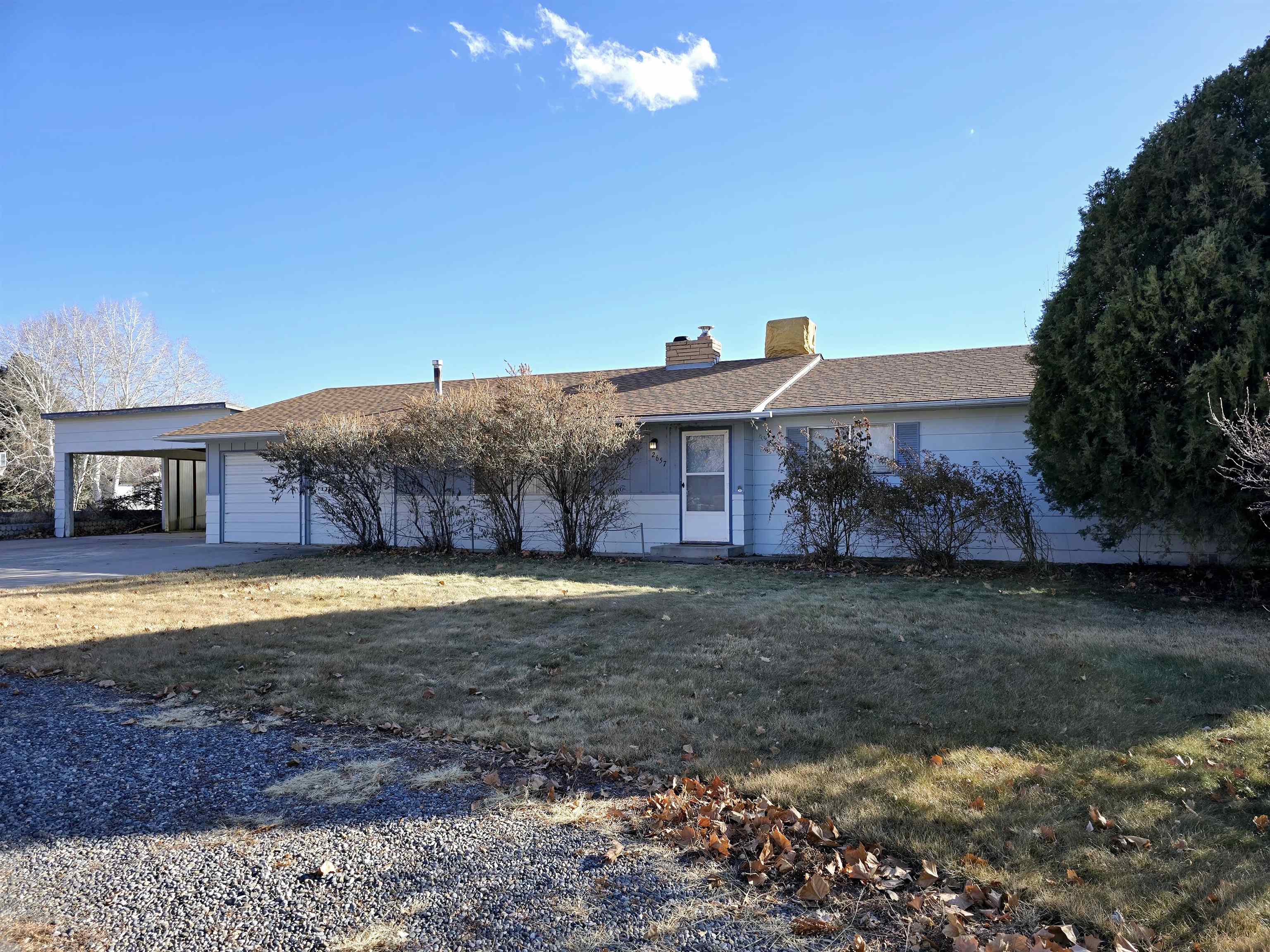 Have you been looking for a home that you can transform into your own style? This one is for you! 3 bedroom, 2 1/2 bath, 2 car garage ranch-style home in the North. With a 2 car carport, there is plenty of room for camper, toys, or additional vehicles. A one-year old roof & a large newer shed are a bonus. And no HOA! This one won't last long.