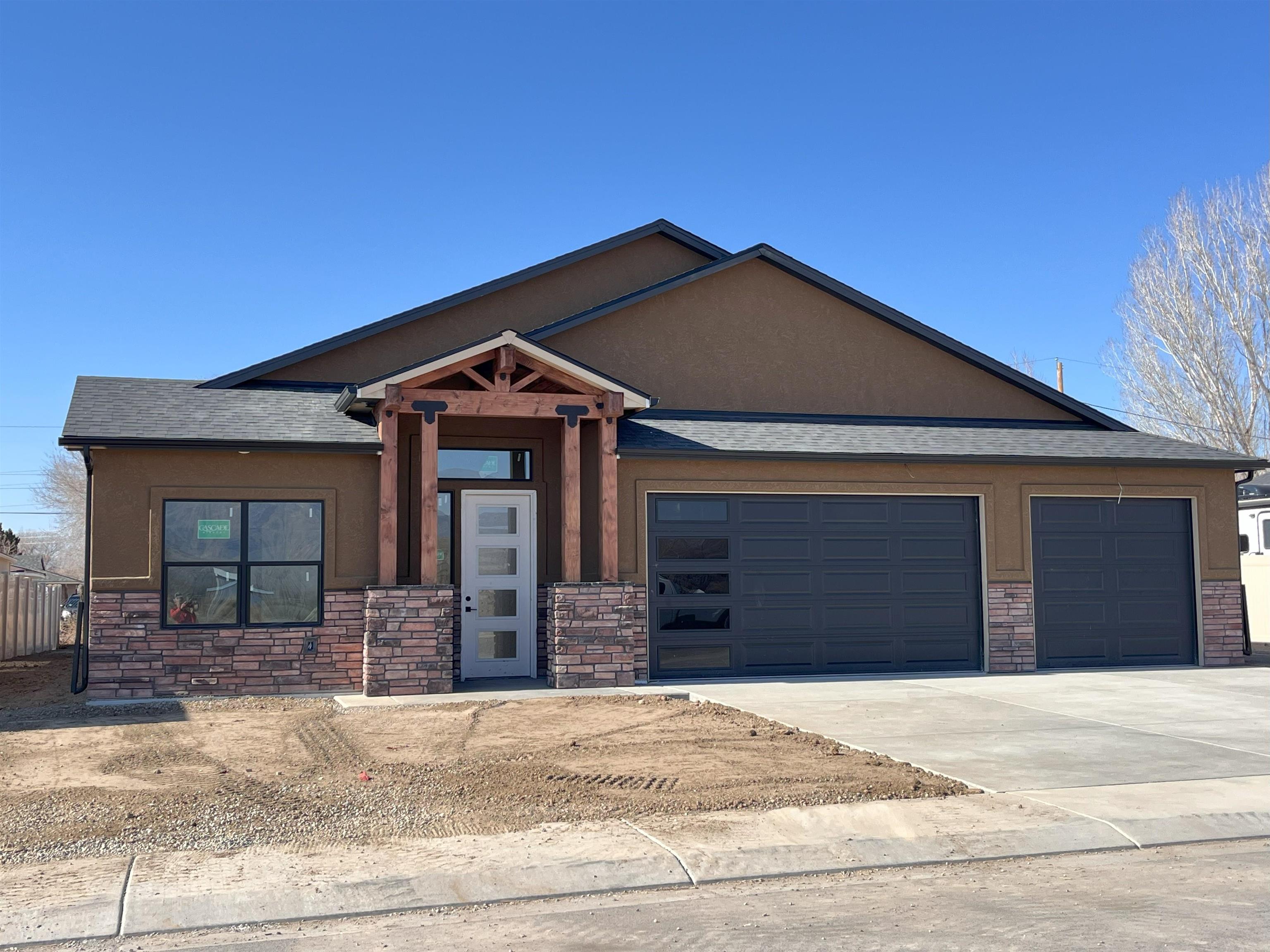 New Construction in Desert Peach Subdivision! A smart design, this home offers a split bedroom floor plan (four bedrooms with the fourth bedroom set up for a nice potential office with easterly views/exposure) and a cute back porch! A bright kitchen, it opens to the living and dining areas! A few perks to this home include TWO dishwashers, a sink in the laundry and EV power in the garage.  With nice interior finishes and a 16' side yard for outside storage or RV parking, this is a great home!  All information subject to change/error, buyer to verify all information.