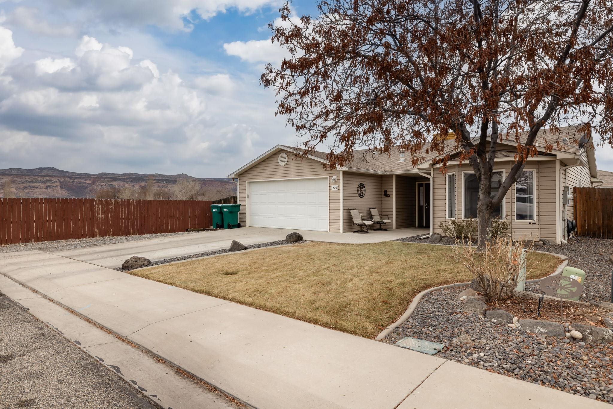 Welcome to this well-kept 3-bedroom 2-bathroom home in Fruita! Home sits at the end of a Cul de sac with views of the Colorado National Monument. Home has all new LVP flooring throughout, all new interior paint, brand new water heater, updated stainless steel appliances and new belt drive garage opener and spring assembly. Great split floor plan has master suite with outdoor access at the back of the home. Home features large windows, breezair swamp cooler and ample storage throughout. Outside you will find a new 2023 6-person hot tub on covered back patio. Fantastic location close to downtown Fruita festivals and outdoor activities including mountain biking trails. Home qualifies for USDA financing. Call today for more information.