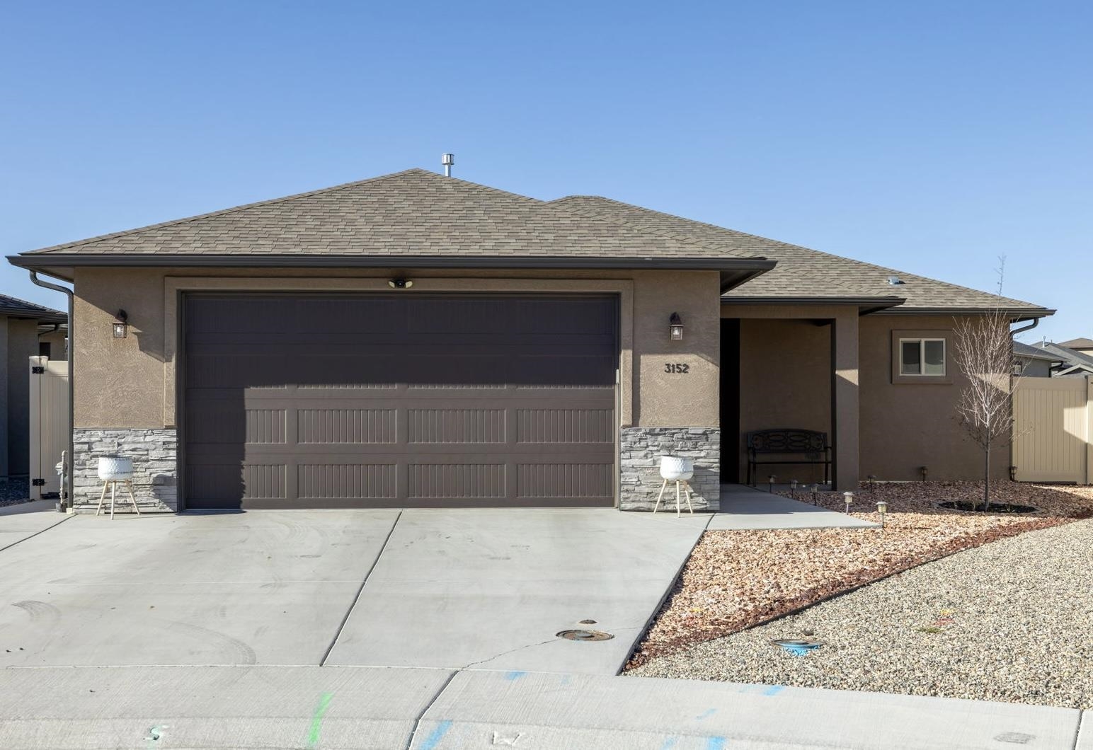 Step into style with this beautifully designed 3-bedroom, 2-bathroom home located in the newly completed Fiddlers Grove subdivision. With 1,577 sq. ft. of thoughtfully crafted living space, this home is the perfect blend of modern elegance, comfort, and functionality.  From the moment you walk through the door, you'll be welcomed by a bright, open-concept layout that’s ideal for both relaxing and entertaining. The chef-inspired kitchen steals the show with a spacious island, sleek granite countertops, and contemporary finishes—a true centerpiece for gatherings.  Retreat to the luxurious primary suite, complete with a spa-like ensuite bathroom and an expansive walk-in closet that checks all the boxes. Two additional bedrooms offer endless versatility for guests, family, or your ideal home office setup.  Step outside and you’ll find your personal backyard escape—featuring a fully fenced yard with fire pit for cozy evenings, grass for play or lounging, and playground equipment that keeps everyone entertained. There’s even a dedicated pet run—perfect for furry companions or extra storage space.  This move-in-ready gem offers everything you’re looking for in a new home—modern finishes, smart design, and outdoor living at its finest.  Don’t wait—schedule your showing today and see why this Fiddlers Grove beauty won’t last long!