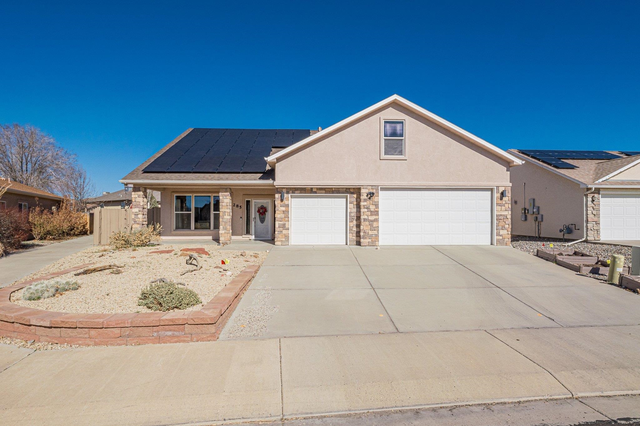 Welcome to your new home in the charming town of Fruita, Colorado! This stunning property boasts a backyard oasis, perfect for enjoying BBQs with friends and family or relaxing under the stars. The primary suite is conveniently located on the main level, offering privacy and luxury. Owned solar panels help offset utility bills for even more comfortable living!  Step inside to find a spacious living room with vaulted ceilings that create an open and airy atmosphere. The bonus room - with adjoining half bathroom - can serve as a fourth bedroom, office space, or playroom - the possibilities are endless! Two more bedrooms and a full bathroom to offer even more space on the main level.   Located in the desirable Vista Valley neighborhood, and just steps from the park, this home offers both convenience and tranquility. Don't miss out on this incredible opportunity to make this house your forever home in beautiful Fruita!