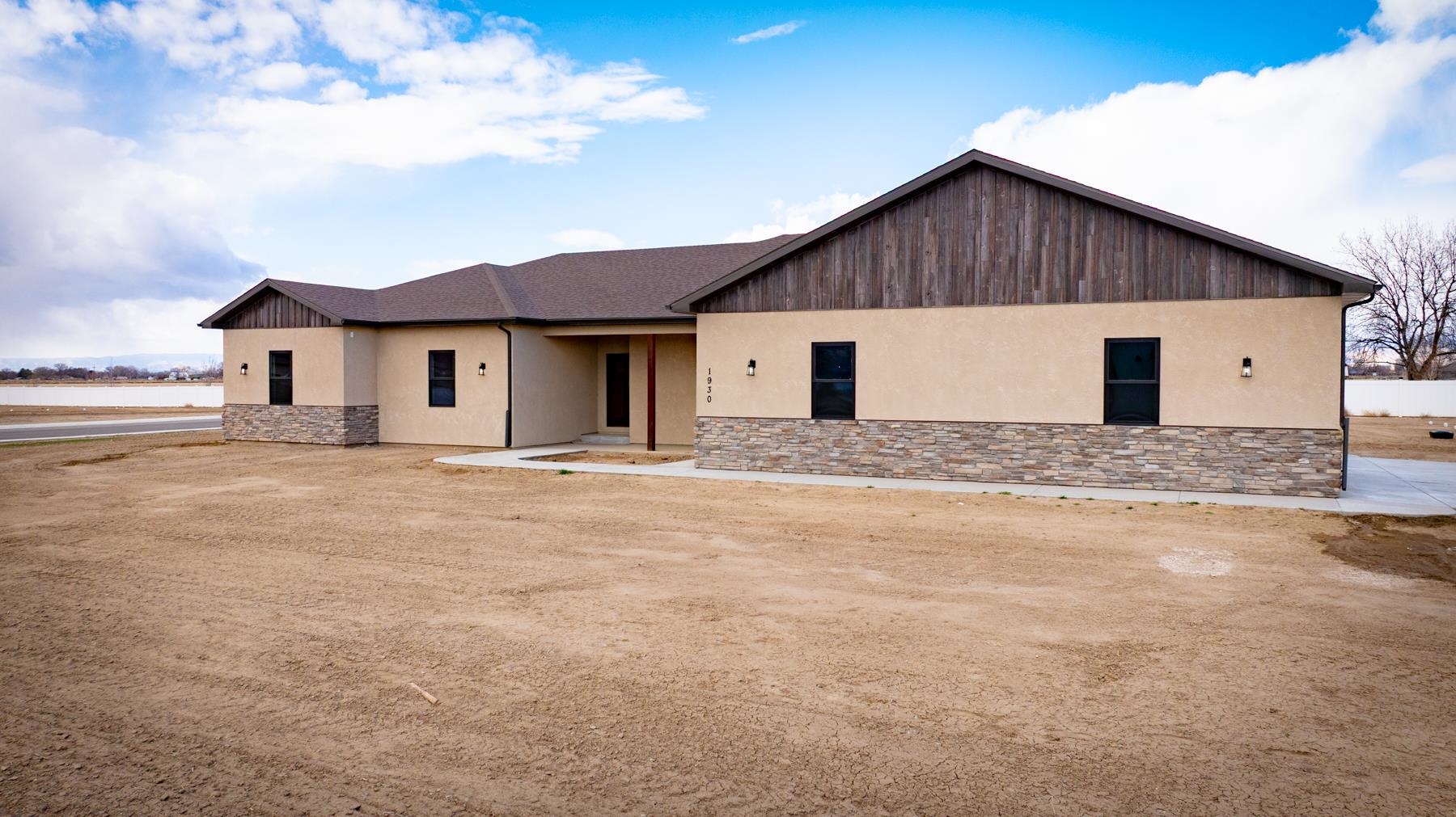 The options are endless in this newly constructed home on 1 acre. The house features beautiful finishes and floor plan. 2625 sqft with a large open living space and access directly to the covered patio. Enjoy a lovely kitchen with a breakfast bar, soft close cabinets and granite countertops. The primary bedroom ensuite has a walk-in chower and standalone tub, along with a huge walk-in closet. It is a split 4 bedroom floor plan and the 2nd bedroom shows off a 3/4 bath as well. The 3 car garage is oversized with an EV charging port. There is room for RV parking and a shop! Get creative and make this home your place!