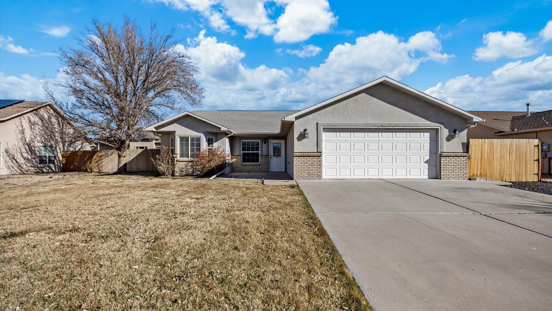 Discover comfortable living in this delightful Fruita residence, perfectly situated for convenience and recreation! This inviting home boasts a desirable split bedroom design, offering privacy and tranquility for all.  Enjoy effortless access to the vibrant downtown Fruita scene, with its unique shops, restaurants, and community events. Just a stone's throw away, the local recreation center provides endless opportunities for fitness and fun.  Step outside and unwind on the amazing back patio – an ideal space for entertaining, grilling, or simply enjoying the beautiful Colorado evenings. This outdoor oasis is sure to become your favorite spot!  This home presents a fantastic opportunity to embrace the Fruita lifestyle. Don't miss out – schedule your showing today!  **Some photos have been virtually staged for reference and design layout ideas**