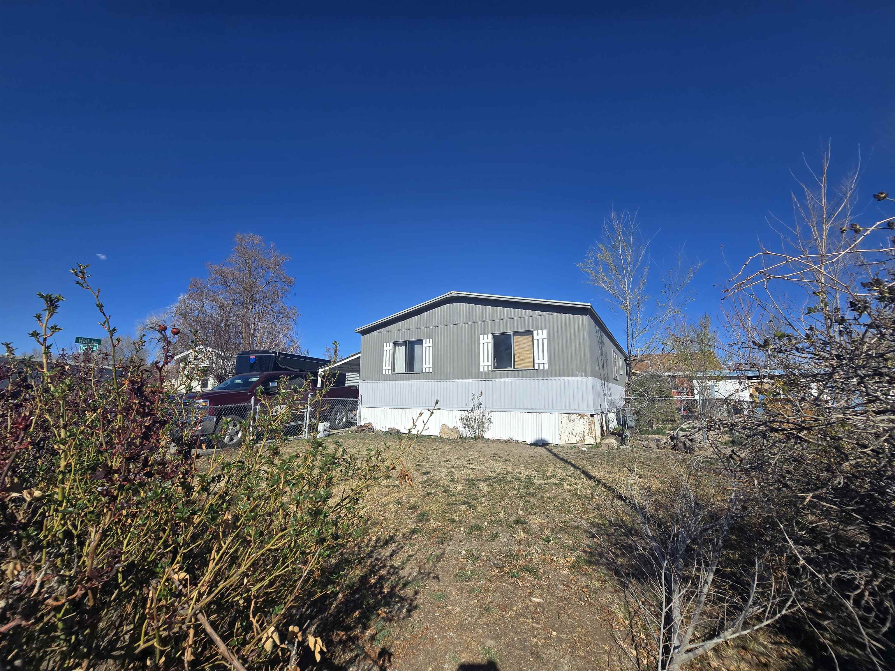 PACKAGE DEAL! YOU OWN THE LOT AND THE HOME FOR UNDER $250,000.00! ALL APPLIANCES INCLUDED. HUGE BACK AND SIDE YARD LEAVES PLENTY OF ROOM FOR YOUR TOYS. LARGE STORAGE SHED IS ALSO INCLUDED WHICH COULD BE USED AS A WORKSHOP. DON'T WAIT.