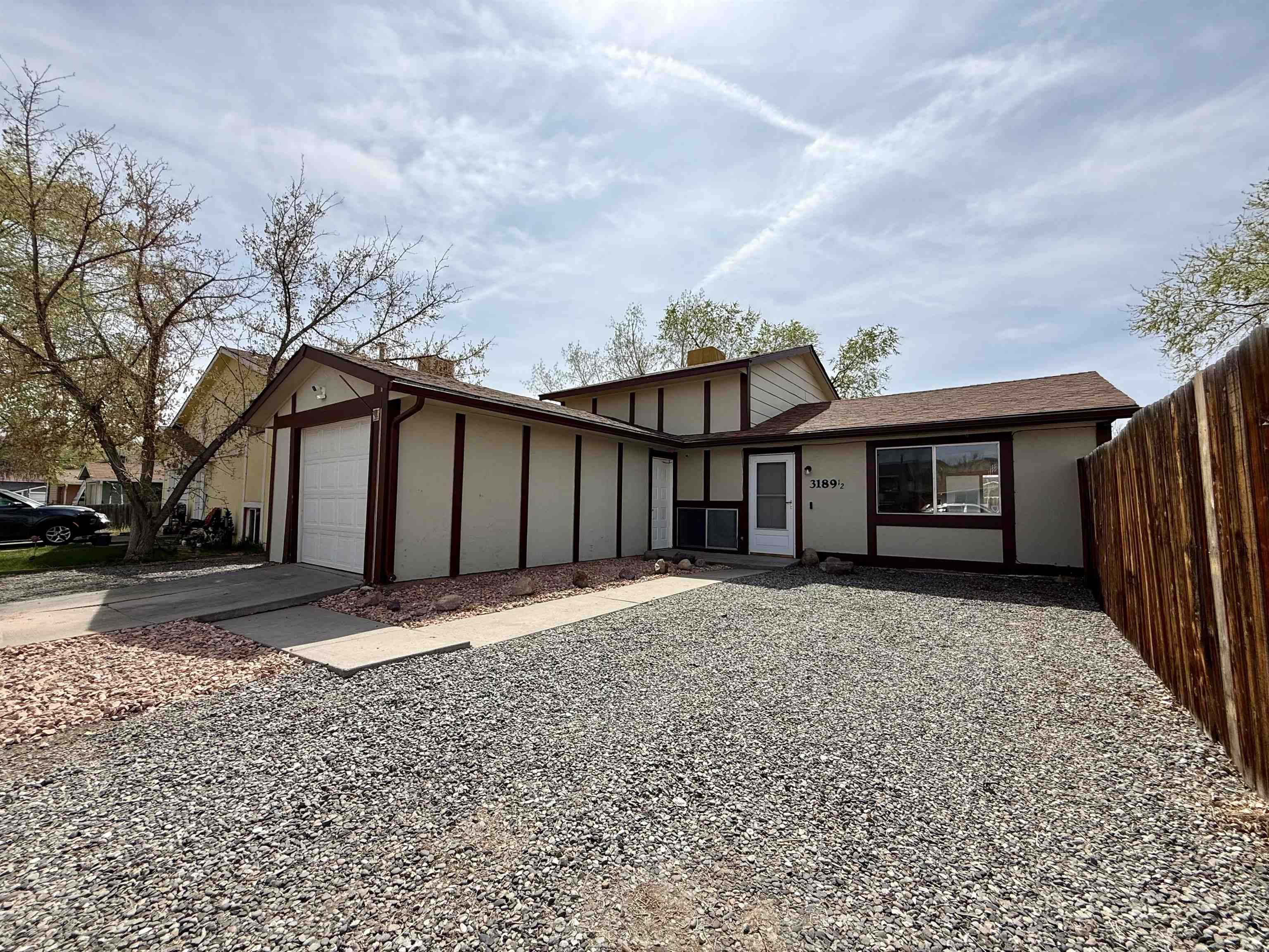 Move-in ready and affordable! New paint and carpet- Downstairs primary bedroom with huge walk-in closet- Some new fencing  Don't miss this one!