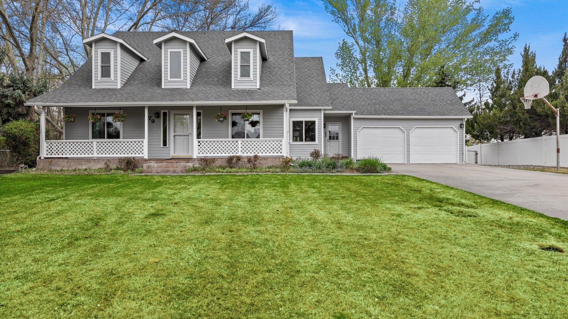 This beautiful home in Loma Rio Subdivision is nestled in a picturesque, park-like setting and is ready for its new owners!  The main level features a formal dining room and two living rooms, one of which boasts a wall of windows and French doors that open to a covered patio. You'll also find a spacious kitchen with a cozy eating area, as well as the primary bedroom and laundry room conveniently located on this floor. Upstairs, there are four large bedrooms and a guest bathroom. If you need extra space, the unfinished basement has served as a fantastic workshop and storage area! If you're looking great outdoor living space, this home sits on a cul-de-sac and backs to an open space. So much room to grow, entertain, and garden. There is also RV parking!