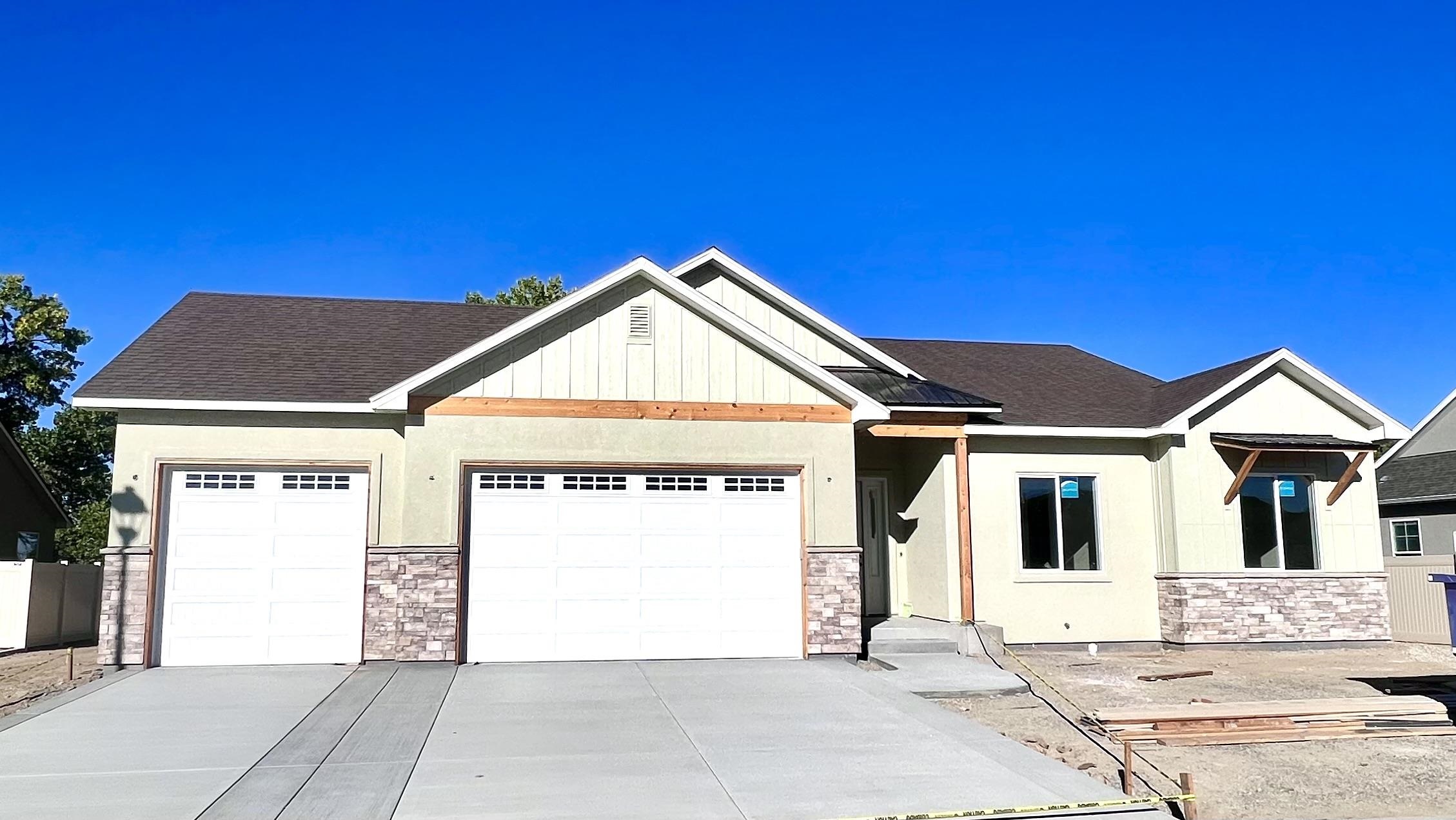 This stunning new build is a MUST SEE! Located in the desirable Orchard Ridge subdivision just minutes from downtown Fruita.  Spacious, premium view lot with room for RV parking, backing to open field bordered with mature trees. Boasting a wonderful 4 bedroom, 3 bath floorplan with beautiful custom finishes and a fabulous kitchen and pantry!  Beautiful, engineered hardwood floors, custom tile, and designer light fixtures.  Extra tall ceilings and doors throughout, along with  9' Garage doors to accommodate large trucks and cars.  This home is also heated with the new, wonderfully efficient, Heat Recovery System.  Plus, engineer designed, extra deep stemwall for comfort and quality! All of the highest intentions, designs,  and processes, pulled together in this amazingly well built home!  All information is subject to change/error without notice. Buyer(s) to verify all.