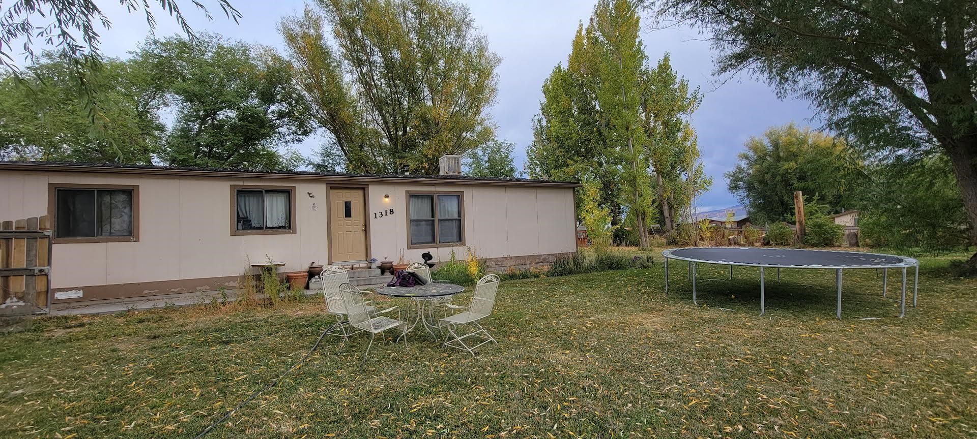 This family home is tucked into a wonderful yard with large trees and  a partial privacy fence.  Inside pictures were not ready.  There is potential here with EXTENSIVE cleanup and deferred maintenance.  Possession date is to be determined by seller agreement.  Sale dependent on removal of cloud title.  Date unknown at this time.