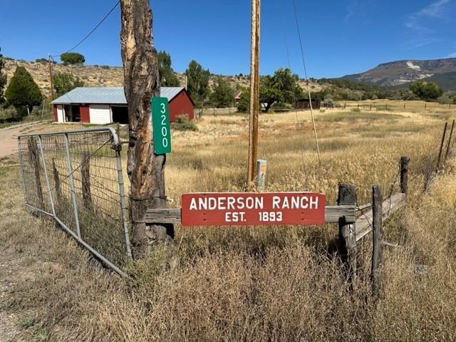 Two mountain country homes, with 7 outbuildings on 94 acres with easy access to the Grand Mesa and BLM where you can enjoy unlimited outdoor recreation. Wonderful views, peaceful and quiet, yet only 20 minutes to Grand Junction. Both homes and outbuildings are on one parcel (36 acres). The second parcel (58 acres) is unimproved. The land consists of native grasses, rolling hills, rock outcroppings, and non-irrigated grazing land. The North Fork of Kannah Creek runs through both parcels. One home has been used as a primary home, and the second home could be a family members or used as a rental. The second home was built in 1949 and has 1153 sqft, 2 bedrooms, one full bathroom, and a new roof in 2023. Both have city water, electric, septic systems, and an owned 1,000 gallon propane tank. Properties like this don't come around very often. This property has been in the same family since 1893.