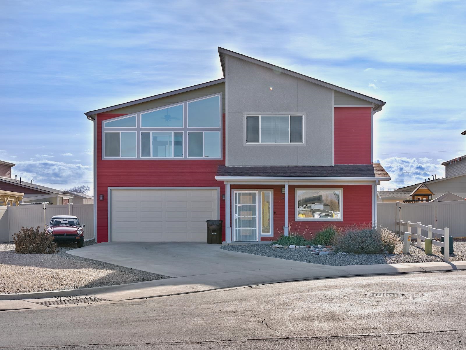 Say hello to  3143 Snake River Drive.  This  home sits in an awesome, modern  neighborhood in Southeast Grand Junction and has all of the perfect conveniences. There is room to spread out in this 3 bedroom, 2 1/2 bathroom, 2,000+ square foot residence with a great enclosed sun room offering amazing views of the bookcliffs. This house has forced air heat, and central A/C to keep you comfortable indoors all year round, with solar panels to help on those pesky electric bills. The back yard boasts an above ground pool, brand new covered hot tub and low maintenance landscaping.  The front yard is full xeriscaped providing low maintenance as well and extra parking for your toys. There are 2 storage sheds, and shelving in the garage for ample storage space as well. Come see your new clean, turn key home today!