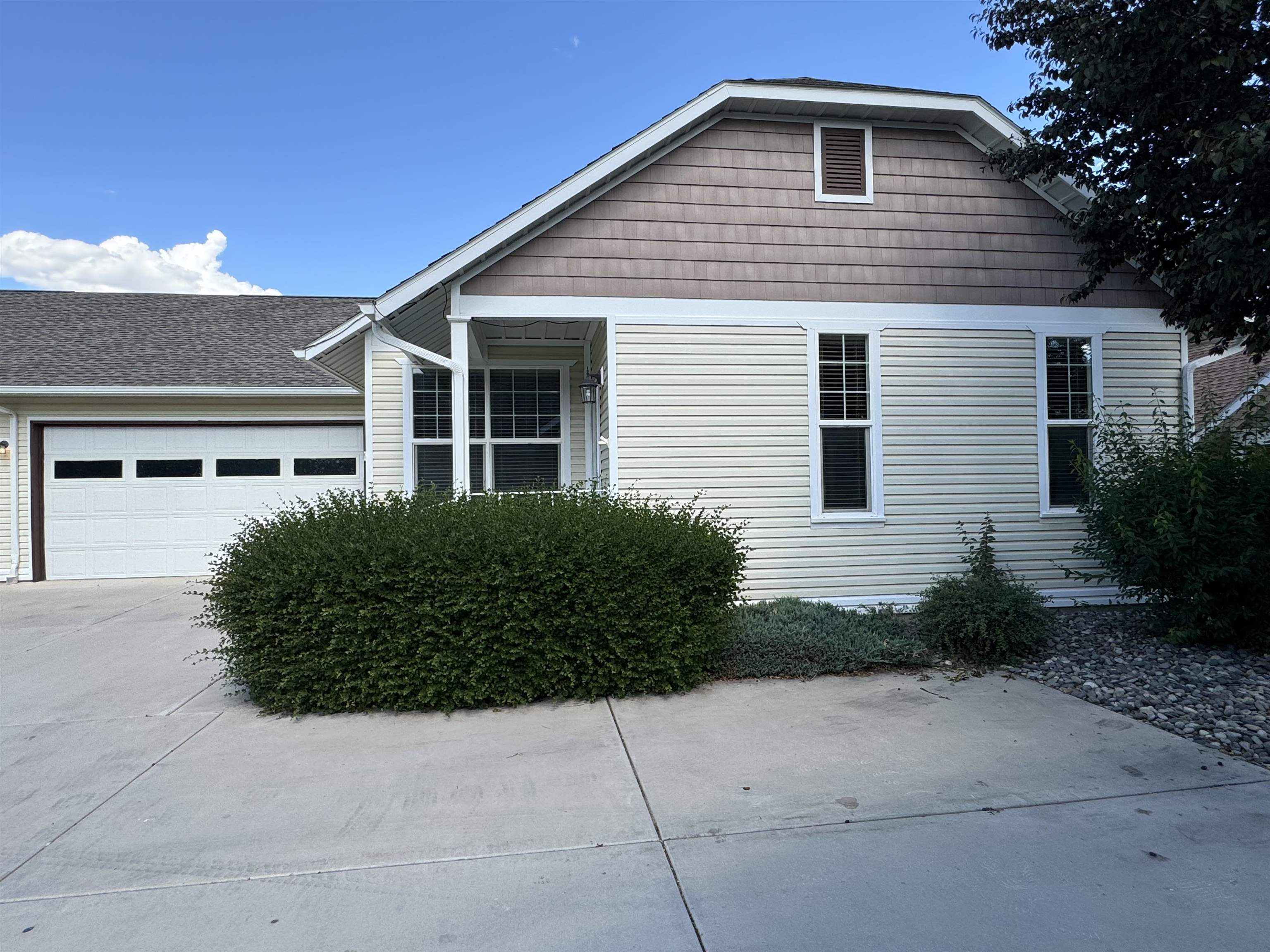 Nice, well maintained Fruita home in the desired Village @ Country Creek, a 55+ age subdivision. This 3 bed/2bath home is 1,561 total SF, paired w/a covered patio, 2 -car garage, electric fireplace, and nice well-kept finishes. With plenty of natural lighting, this home has a beautiful kitchen that outlooks the dining room & counter seating, and flows into the open living room area w/built-in cabinets/entertainment center w/ a fireplace. This is a wonderful low-maintenance home for quiet and relaxing living.