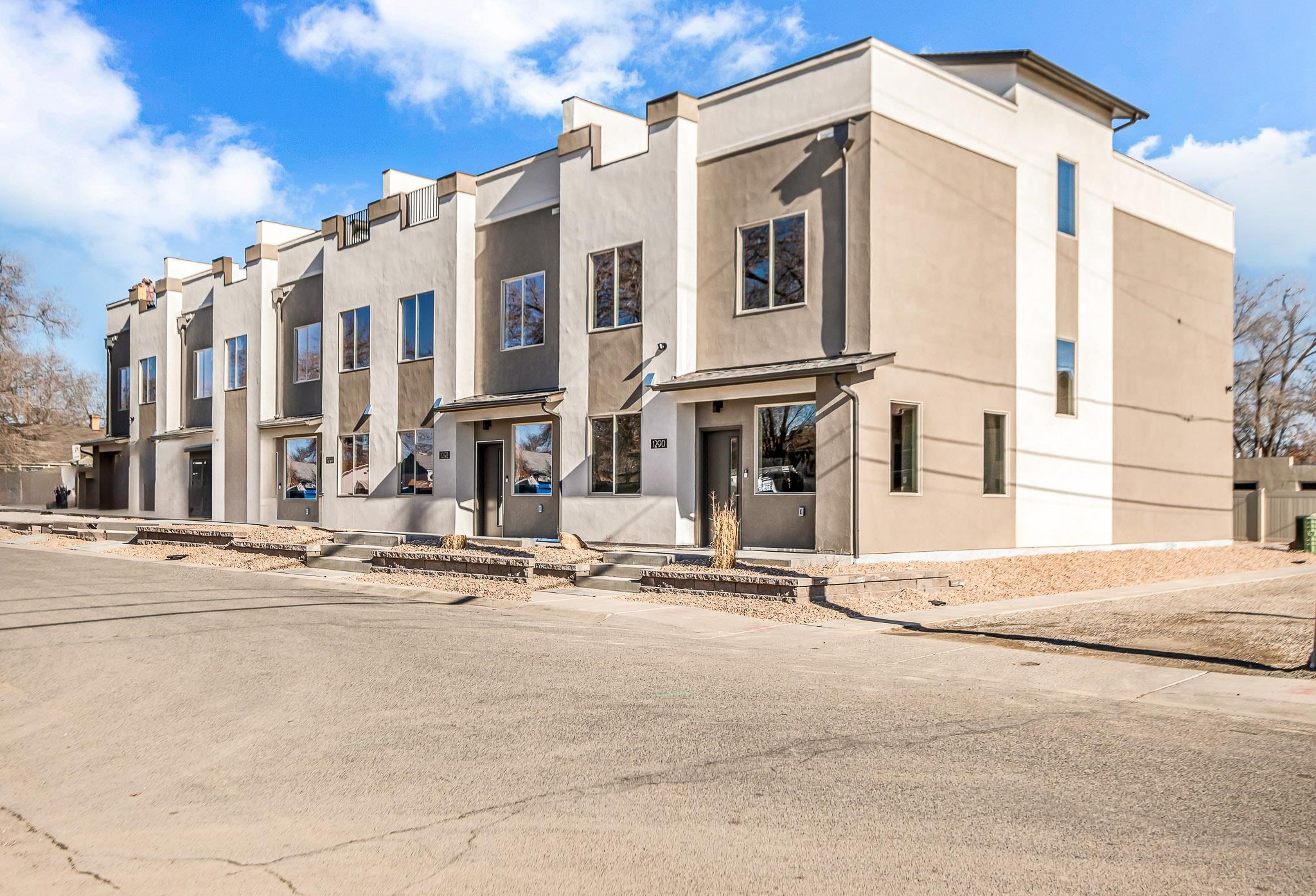 Looking for an easy investment property? Brand new townhouse complex. 3 units of a 5 unit complex. .1 miles (550 ft) from CMU, closer than some dorms! Each unit has 4 bed, 3 bath, 2 car attached garage with storage and rooftop deck at 1662 sq ft. Builder warranty for another year. 5.9% cap rate with a NOI of $96,000 for the 3 units.  Easy to maintain, HOA takes care of all landscaping and snow removal as well as the monthly bill for a DEDICATED 1G FIBER internet line to each unit. All units currently leased or signed and deposit received!! Superior Energy Efficiency - these townhouses are DOE Zero Energy Ready and Energy Star certified. No gas, no combustibles, fresh air fans, improved air quality, heat pump energy savers and all appliances!!! Offers must state; "Wendi Gechter, CO licensed Real Estate Agent, is also part Seller". Appraisal from last year shows the appraised value at $560K/unit, with $3000/monthly rent. Appraisal available upon request.  This is for units 1290, 1292 and 1298 Nth 13th Street
