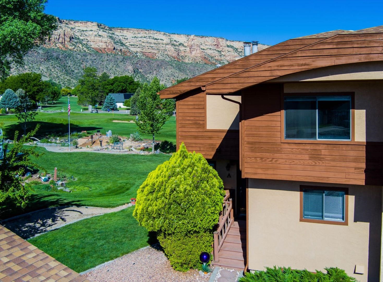 What could be better than owning a lovely spacious condo on Tiara Rado Golf Course with stunning views of the Colorado National Monument? Here is your chance! This three story end unit with 3 bedrooms, 3 ½ baths, two living areas, and large kitchen is perfectly situated on Hole #2. The primary with bath and one additional bedroom and bath are located on the upper level, with one bedroom and bath on the lower level. The home has been freshly painted and includes wood laminate flooring, carpet and all appliances, as well as a pellet stove on the main level, and a wood-burning fireplace on the lower level. Close to hiking trails, this home is perfect for live-in owners or investors. This is the lifestyle you’ve dreamed about – come see it today!
