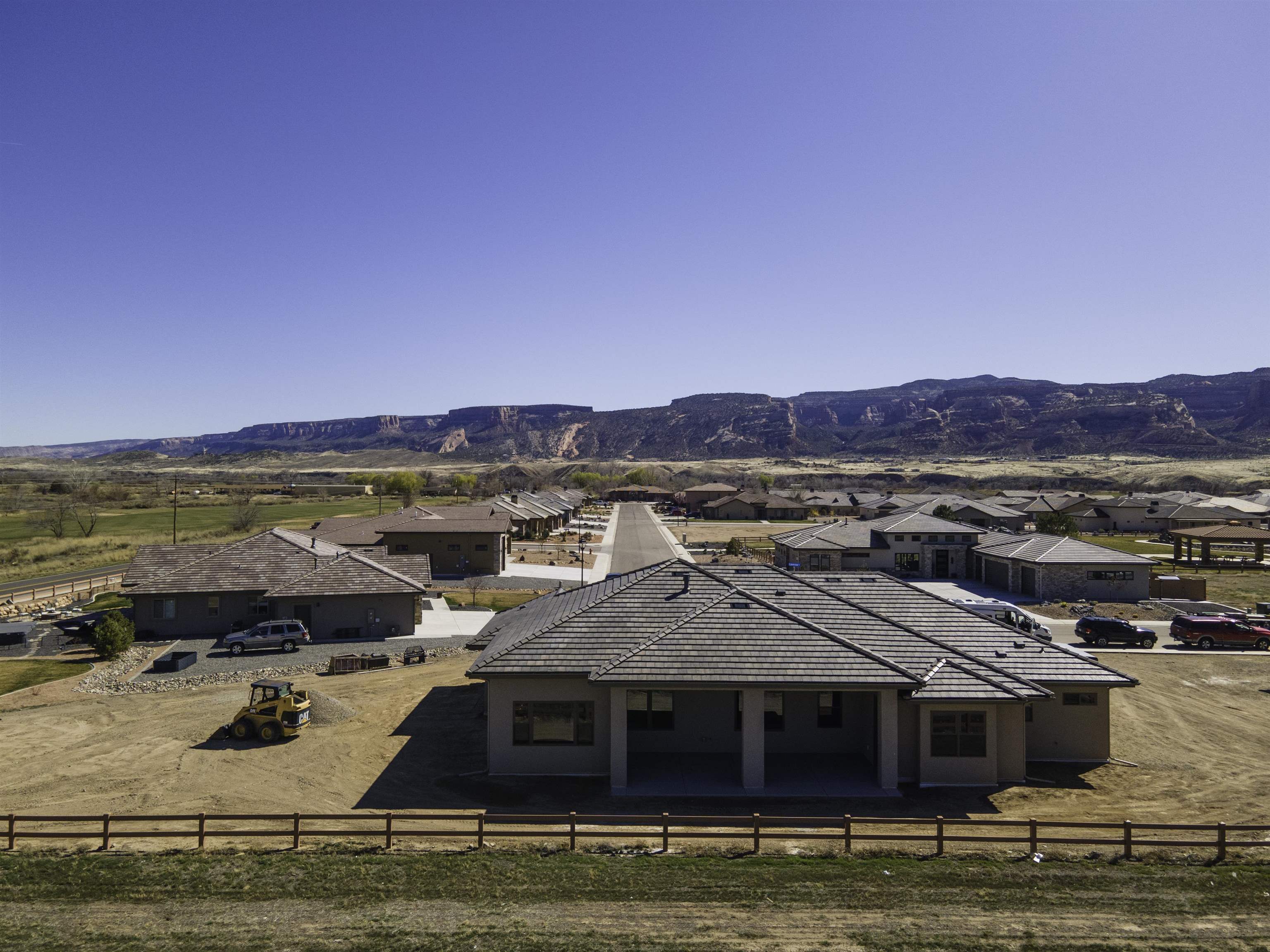 Welcome to 1485 Lakeview! Brand new construction by Schafer Construction! This stunning home sits on the edge of the Adobe Creek Golf Course and has gorgeous views of the Colorado National Monument, Grand Mesa and the Bookcliffs. This beauty has 4 bedrooms, 2.5 bathrooms, a 3 car garage, custom floorplan and dazzling finishes. Enjoy the luxurious kitchen with a gas range, wall oven and magnificent Black Marinace Granite island. The kitchen opens into the large living room with 11' ceilings. Cozy up to the gas fireplace while enjoying the lush views of the golf course. Entertain on the covered patio where you can easily hook up your grill to the gas connection. The Primary Suite is what dreams are made of!! Unwind from your day in the large soaking tub. There's plenty of room for the fashionista with the almost 10' x 14' walk-in closet! The 2nd bedroom is versatile as an office or guest room. A Jack-and-Jill bathroom connects bedrooms 3 and 4. The Laundry Room is beyond amazing!!! Come see your new dream home!!!