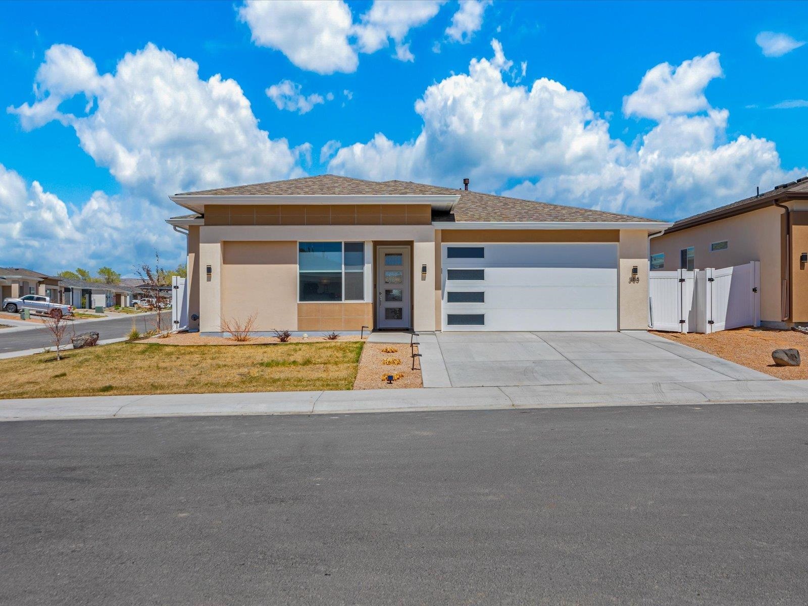 Welcome to 368 Wind River Drive, nestled in the breathtaking beauty of Grand Junction, Colorado! Better than brand new Prepare to be enchanted by this modern oasis, with unique private access to the picturesque Colorado River Front Trail just steps from your front door.  This immaculate home offers the perfect blend of comfort and sophistication with 3 bedrooms, 2 bathrooms, and a split plan layout that feels very spacious. Built in 2022, this residence is better than new with upgraded appliances(Gorgeous Samsung Bespoke refrigerator and matching microwave, Samsung gas range oven), installed blinds, fully landscaped, and contemporary finishes throughout, providing a sleek and stylish living experience.  Situated on a coveted corner lot, the property showcases landscaped grounds that frame the home in natural beauty. Imagine enjoying your morning coffee on the charming back patio while you look at Mt Garfield and The Grand Mesa or take a stroll, ride your bike, or walk your pet on the River Front trail all while relishing in the serenity of this peaceful neighborhood.  Experience the joy of community living with access to the neighborhood's beautiful common areas, ideal for picnics, yard games and leisurely strolls. With ample parking available for your guests, entertaining is a breeze in this welcoming subdivision.   Don't miss your chance to call 368 Wind River Drive home—a rare opportunity to embrace the Colorado lifestyle in a residence that seamlessly combines modern luxury with the tranquility of its surroundings. Schedule your showing today and prepare to fall in love!