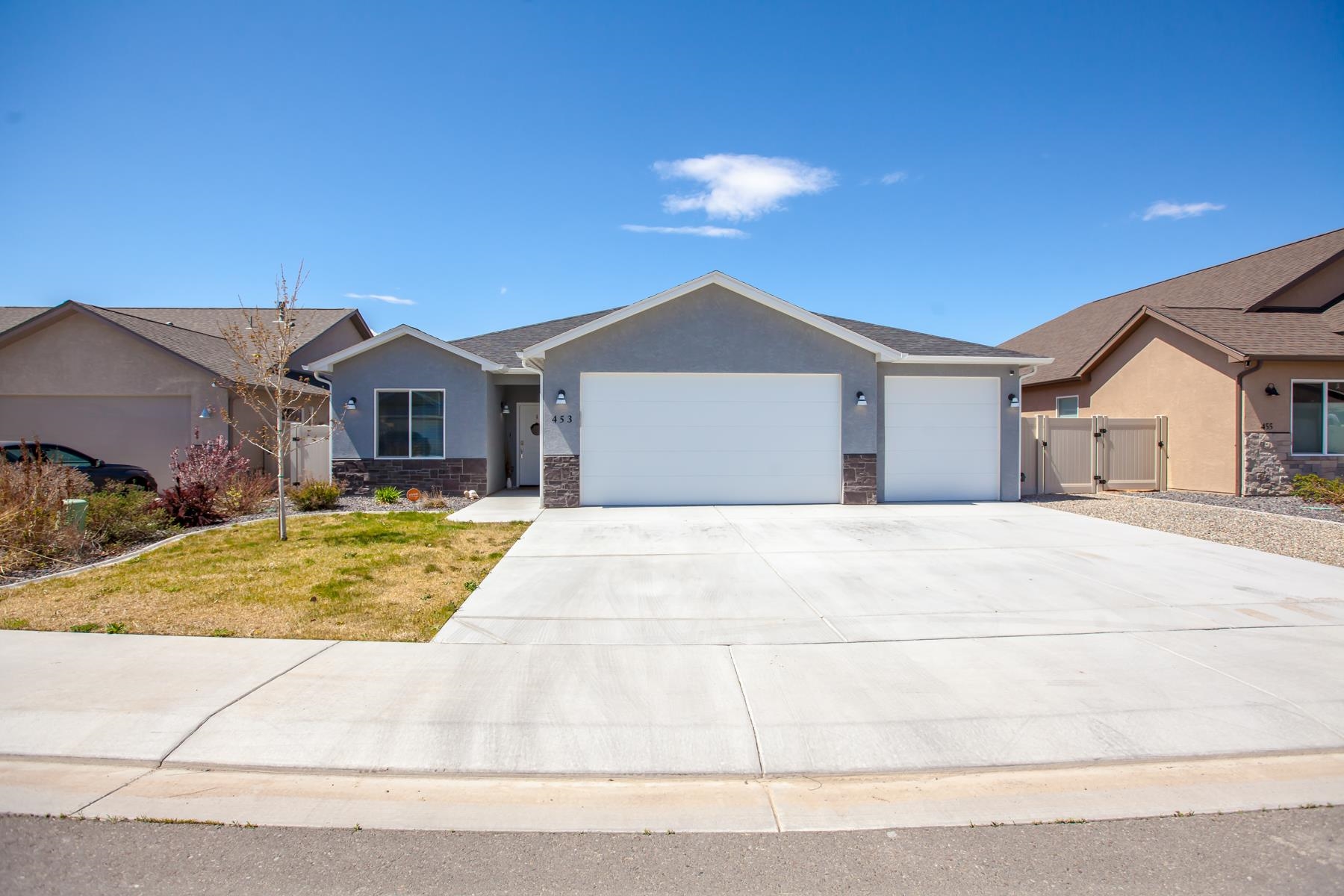 Come see this like-new home that combines comfort, style, and smart living. Inside, sophistication meets convenience with tiled showers, backsplashes, granite countertops, and a layout designed for modern living. The unique backdrop of a drainage reservoir offers privacy and views, enhanced by a pre-installed Vivant security system with cameras, window/door sensors, and keyless entry for peace of mind. The house features 9 ft ceilings throughout, a vaulted living area for that open, airy feel, and a spacious master walk-in closet. Central heating/air ensures year-round comfort. Enjoy a spacious 3-car garage with keypad and app-controlled access, plus overhead storage for easy organization.  Every detail of this home, from its thoughtful design to its high-tech features, makes daily living not just easy, but extraordinary.