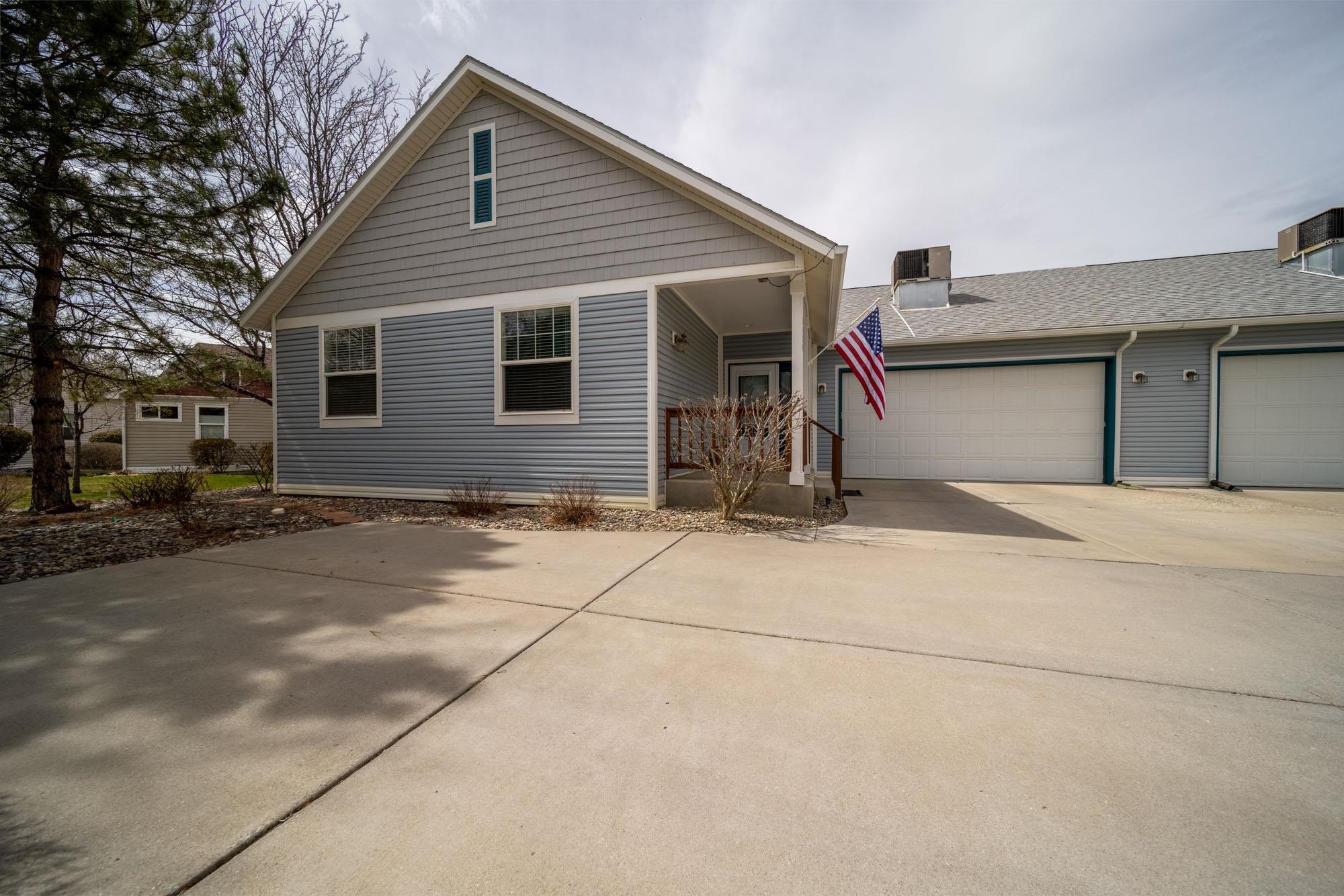 OPEN HOUSE SUNDAY JULY 21, 2024 11AM-1:30PM  - Lovely neighborhood in a 55+ community, the only real community of its kind in Mesa County. Home is attached to front unit at the garage, Quality construction throughout, peaceful back patio is private and features a built in sitting area. Inside is a split bedroom floor plan that is open and spacious. Primary has storage galore with one of a kind closet system that utilizes all the space with pulls downs from the top rack, built in drawers and barn doors to hide it all. This particular floor plan has a great office nook, the roof is 4 years old and this home has been well cared for.