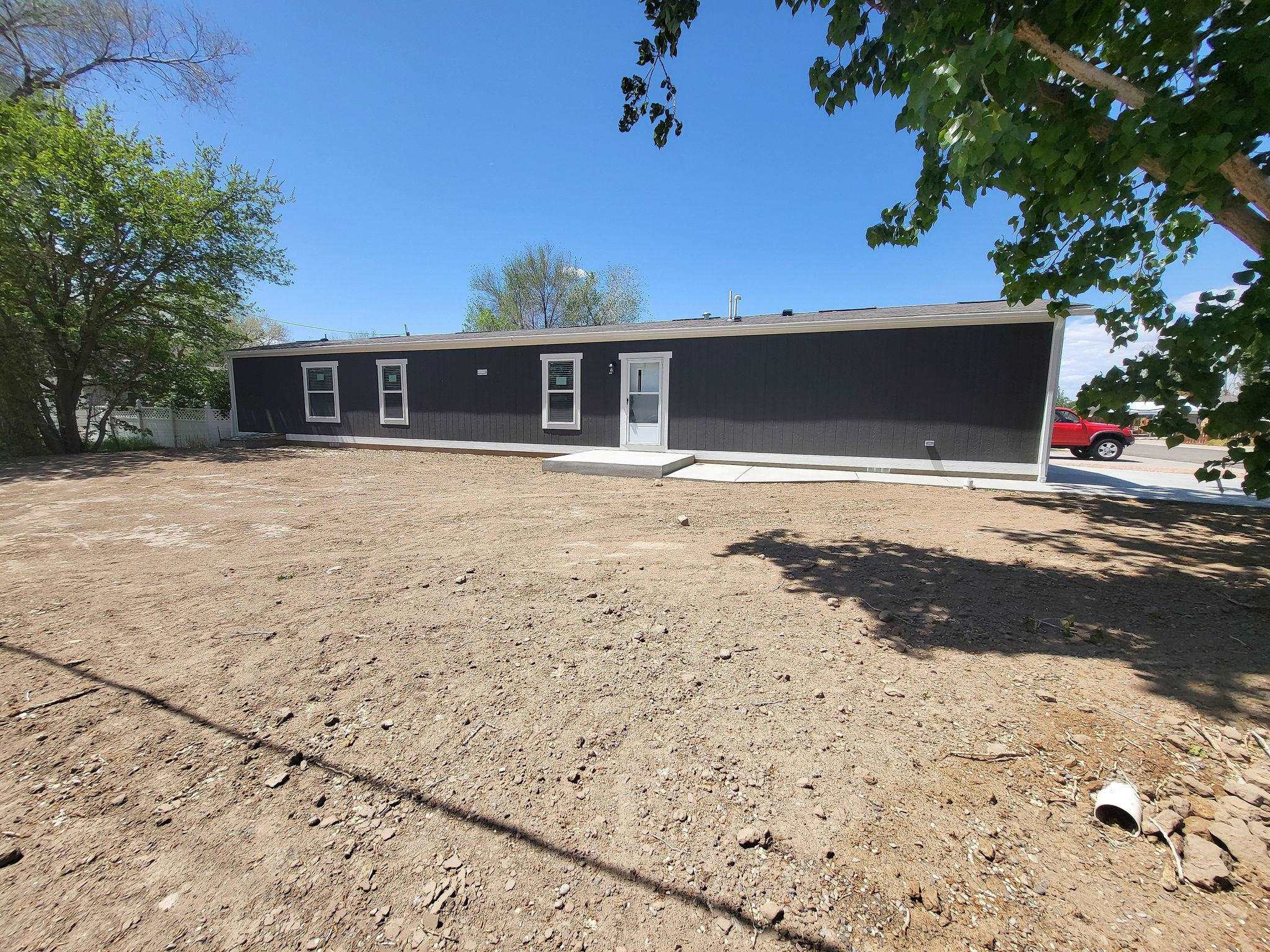 Affordable brand new 3-bedroom, 2-bathroom home in Fruita ON A CORNER LOT. This new home comes with staging furniture and is ready to go. Home is on a permanent foundation with a crawlspace. You don’t want to miss this one! Get in quick! All information is subject to error.
